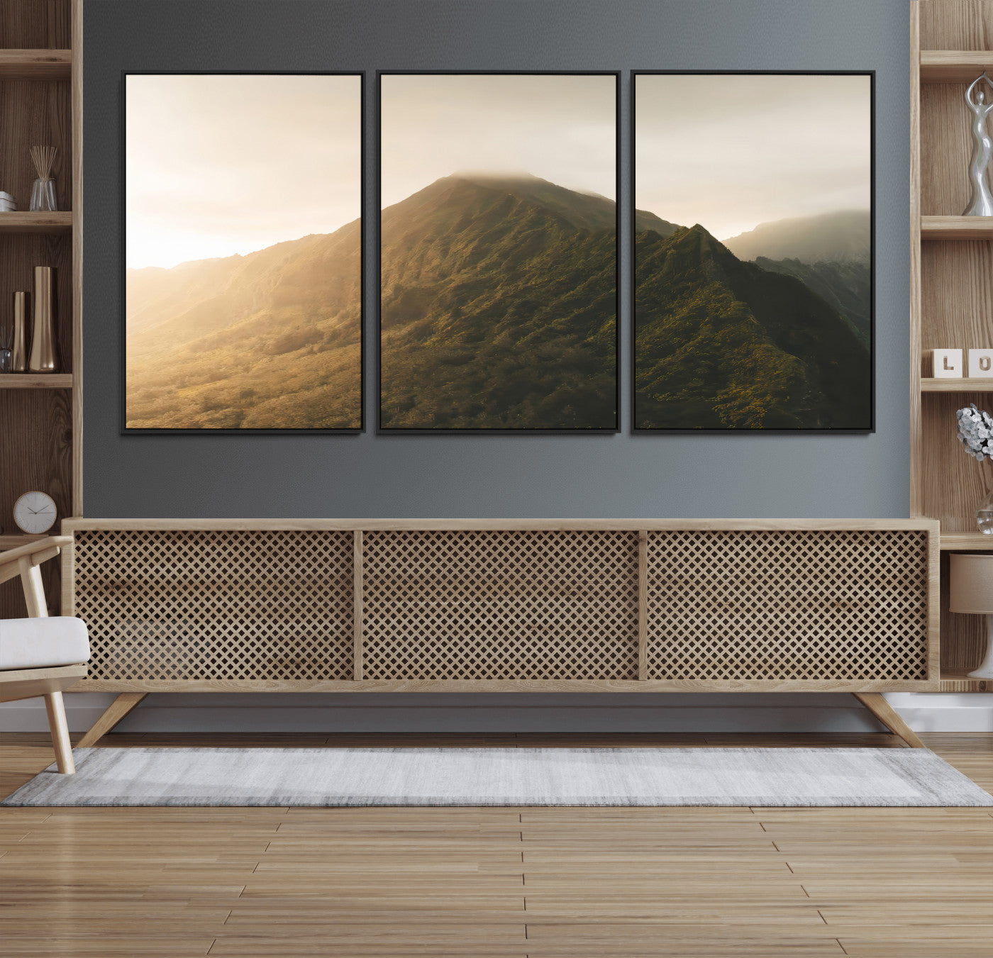 Sunlit mountain peak with mist rolling over its rugged slopes, bathed in golden light, creating a warm and tranquil nature-inspired scene.