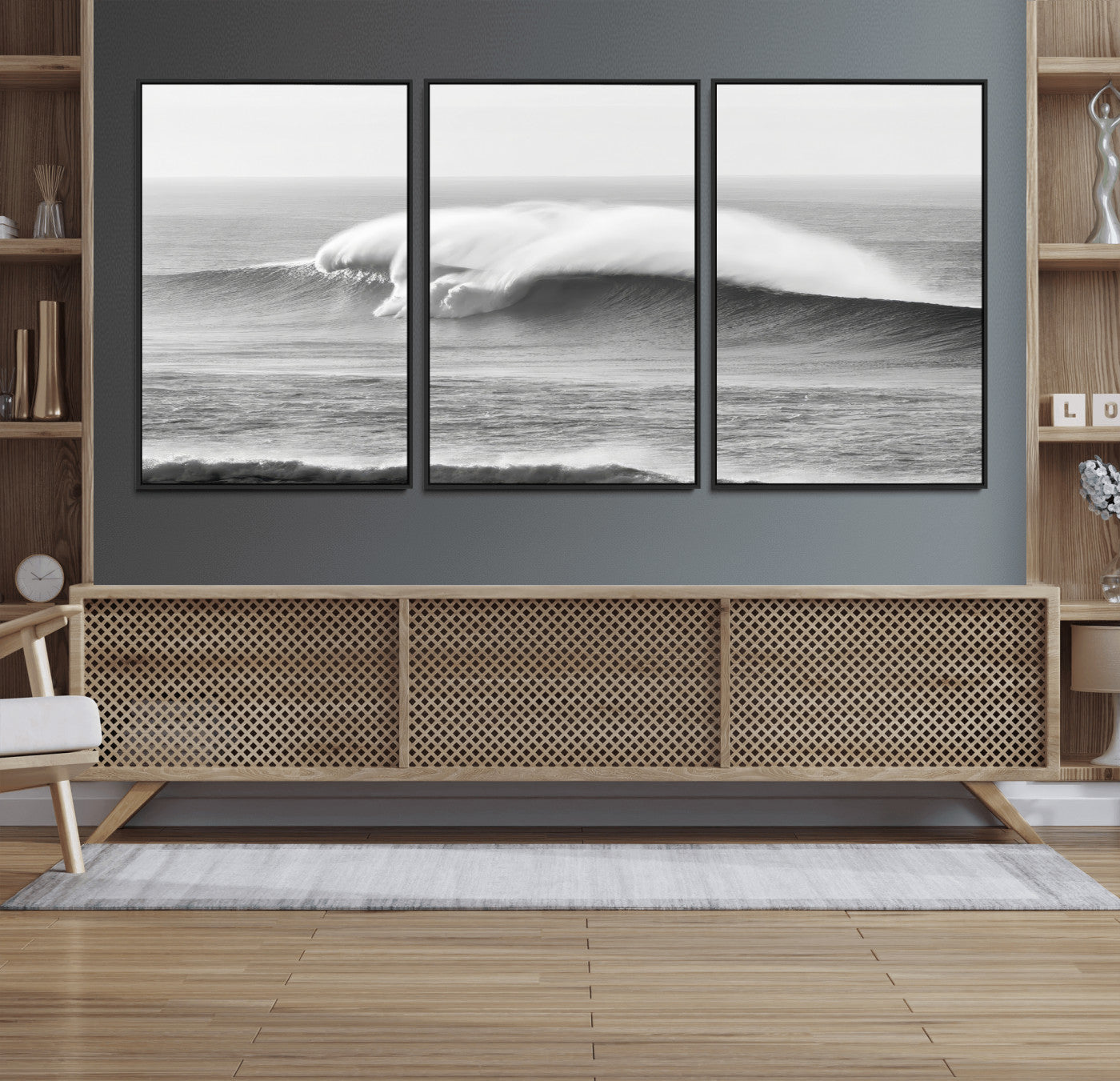 A dramatic black and white ocean wave crashing with immense force, capturing the raw power and movement of the sea in a bold seascape.