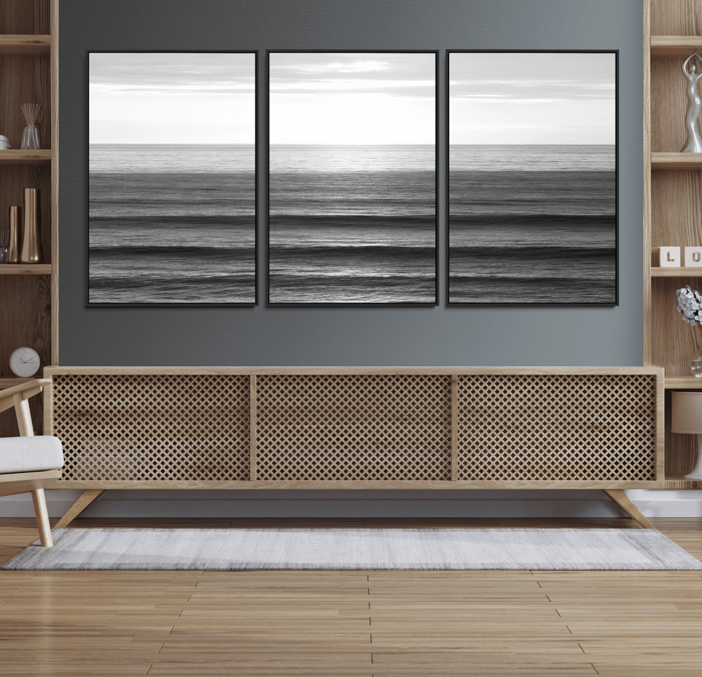 Minimalist black and white ocean view with layered waves reflecting sunlight, evoking a sense of calm and coastal serenity.