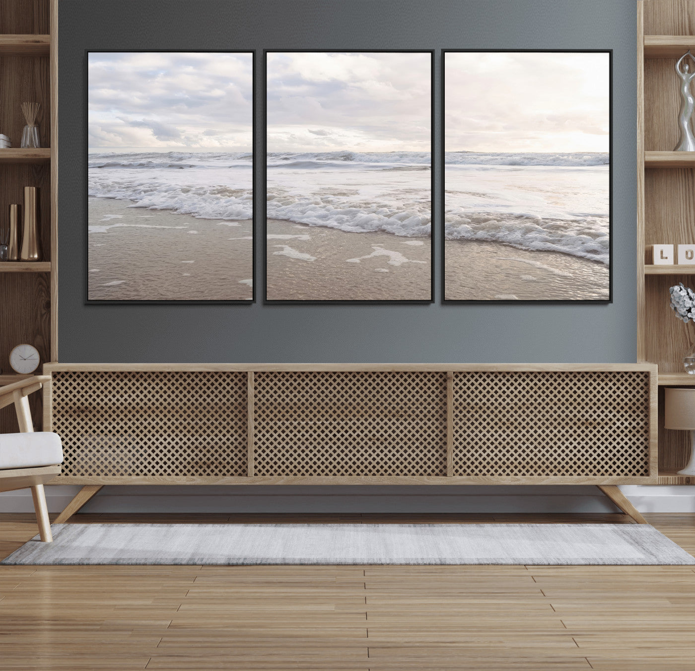 Peaceful ocean waves rolling onto the sandy shore under soft light, perfect for neutral or coastal minimalist decor themes.