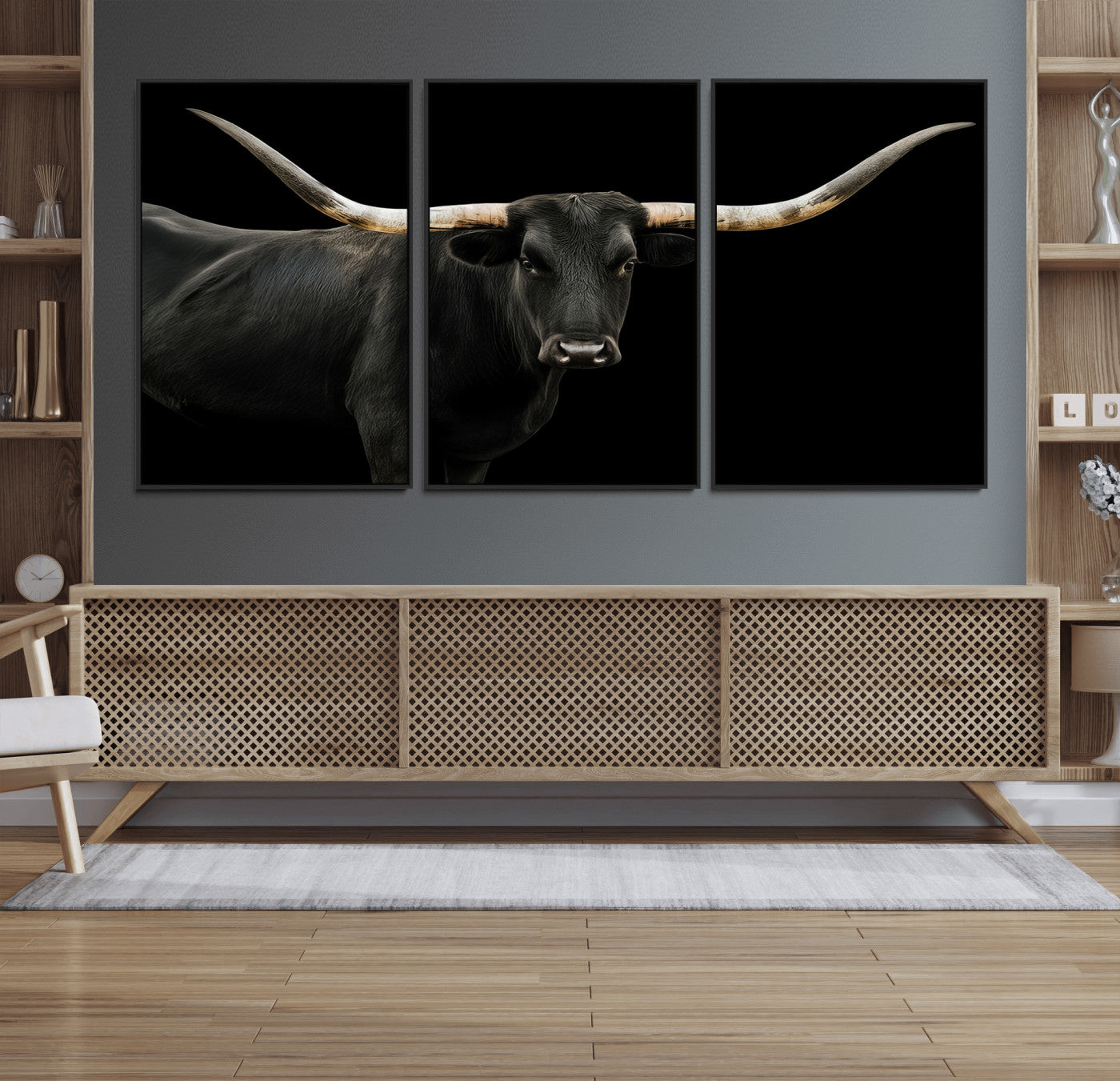 Close-up of a black Texas longhorn with large curved horns on black background, ideal for rustic farmhouse or modern western interiors.