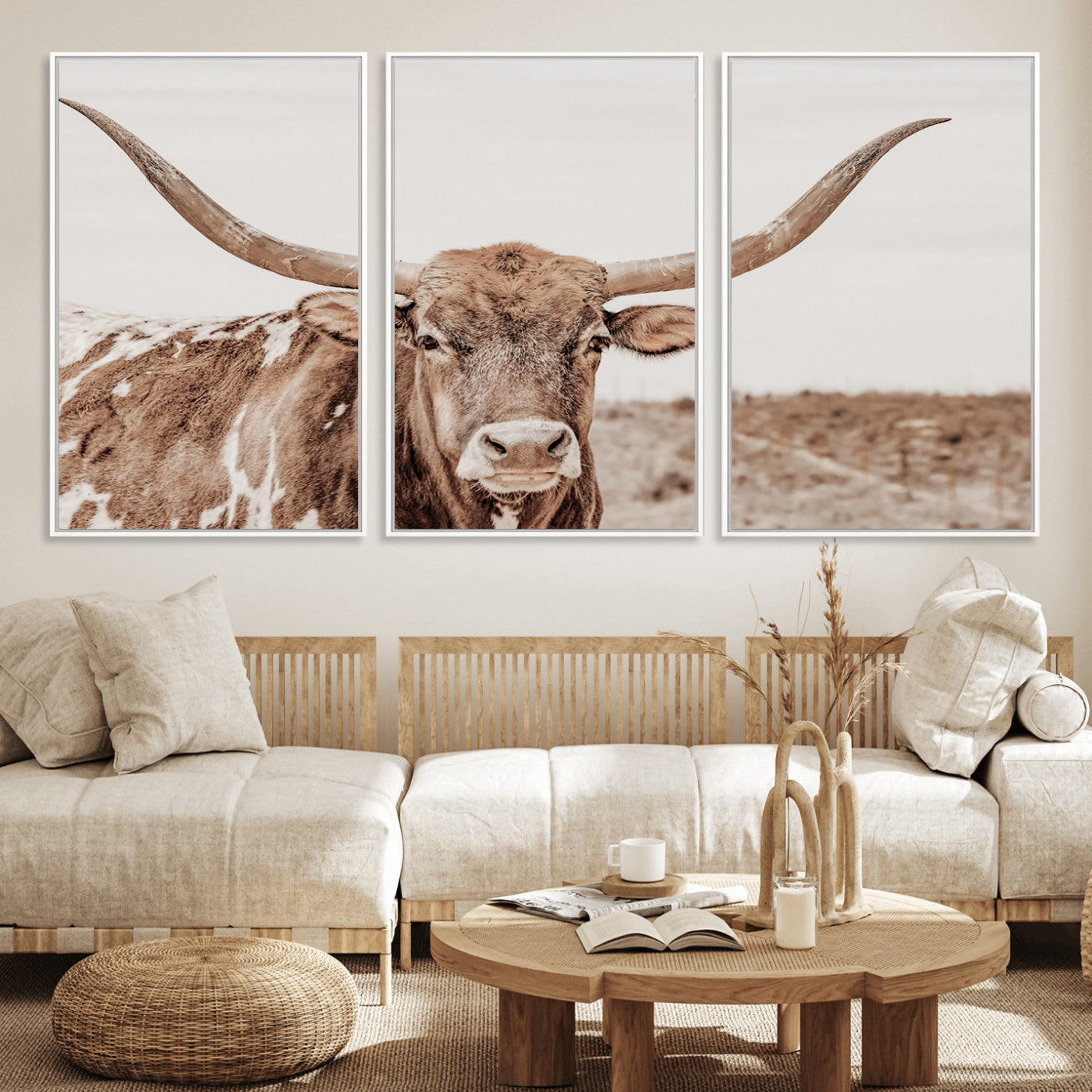 A longhorn cow in soft beige desert tones, standing calmly in open land, perfect for neutral western or rustic farmhouse interiors.