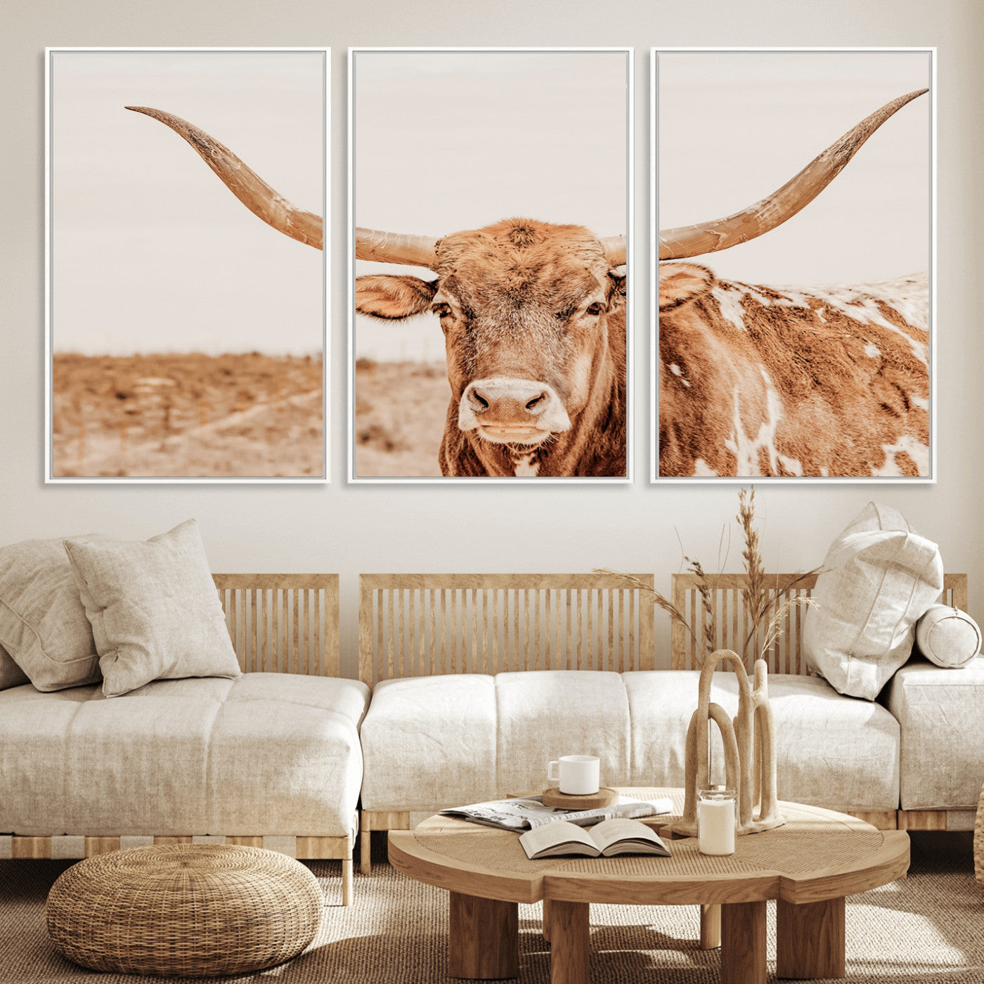 A longhorn bull standing proudly in a sunlit desert field with warm neutral tones, ideal for rustic western or farmhouse interiors.