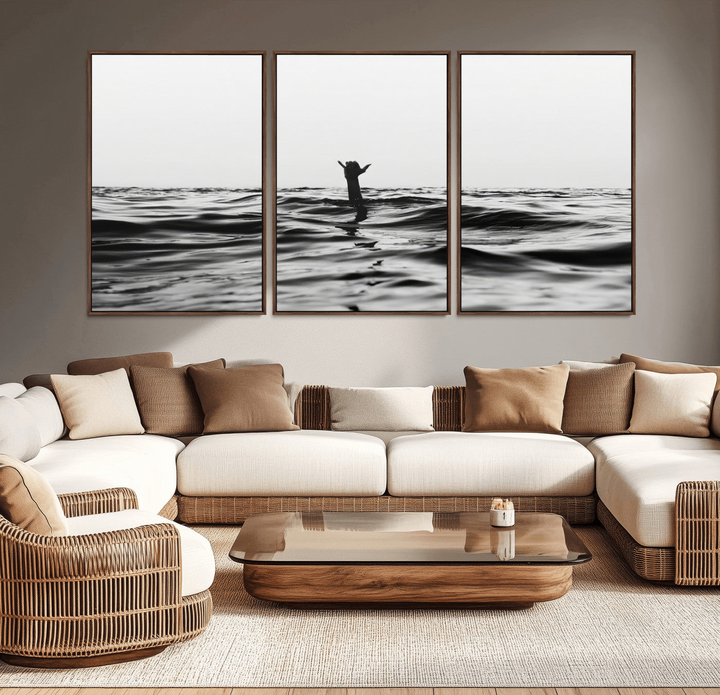 Black and white ocean with a hand making a surfer sign among dark waves, creating a dramatic and minimalist seascape with bold contrast.