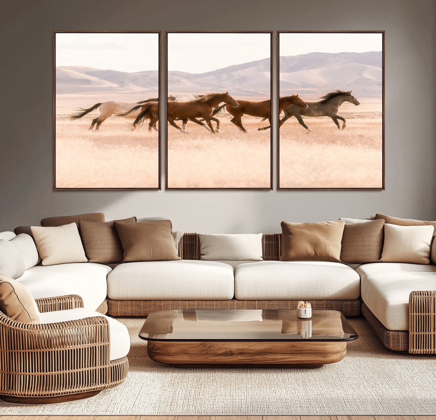 A herd of wild horses galloping through a sunlit desert plain with mountains in the background, perfect for rustic or western-themed wall decor.