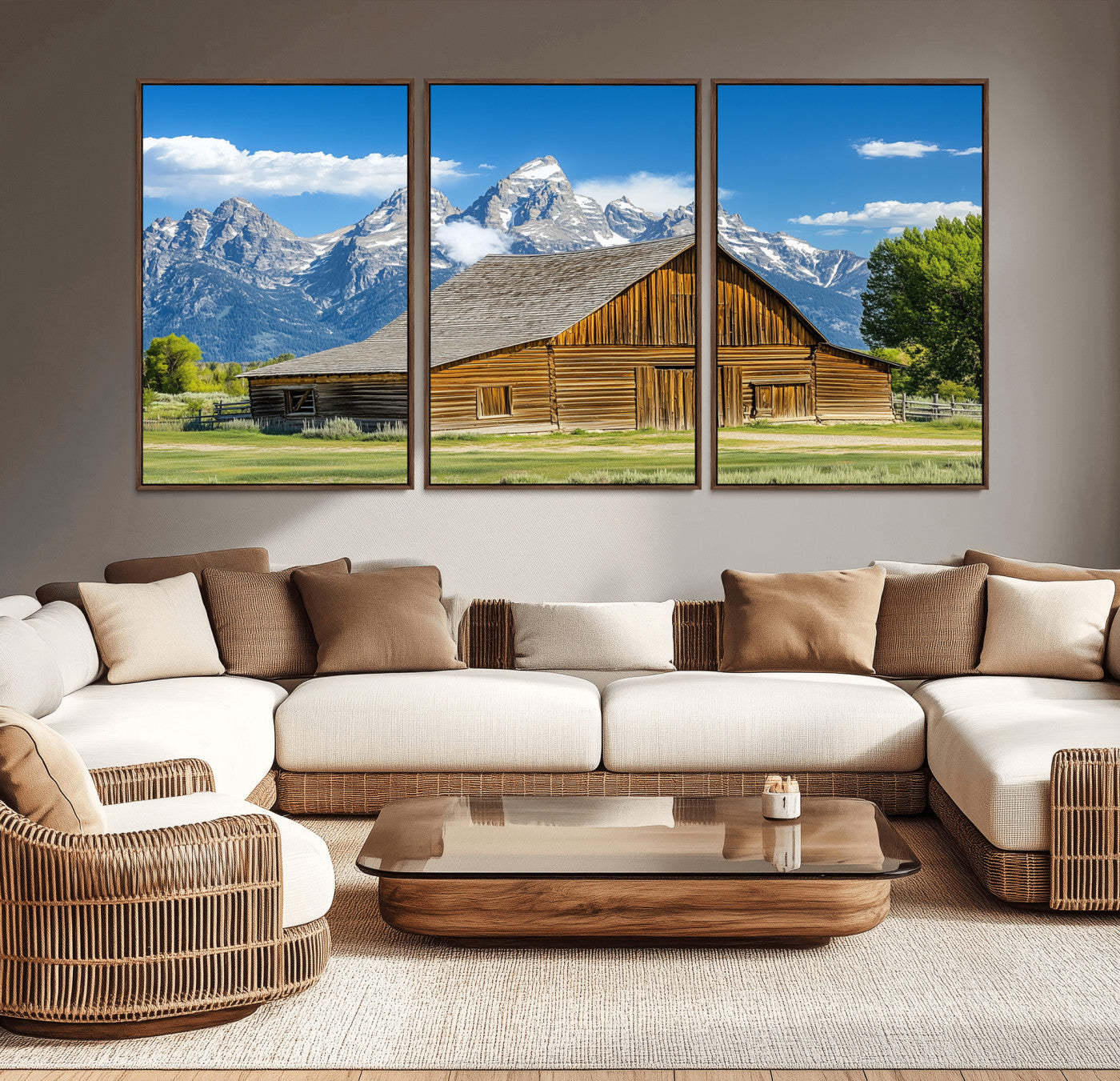 A rustic wooden barn sits in front of towering mountain peaks under a clear blue sky, perfect for farmhouse or cabin style interiors.