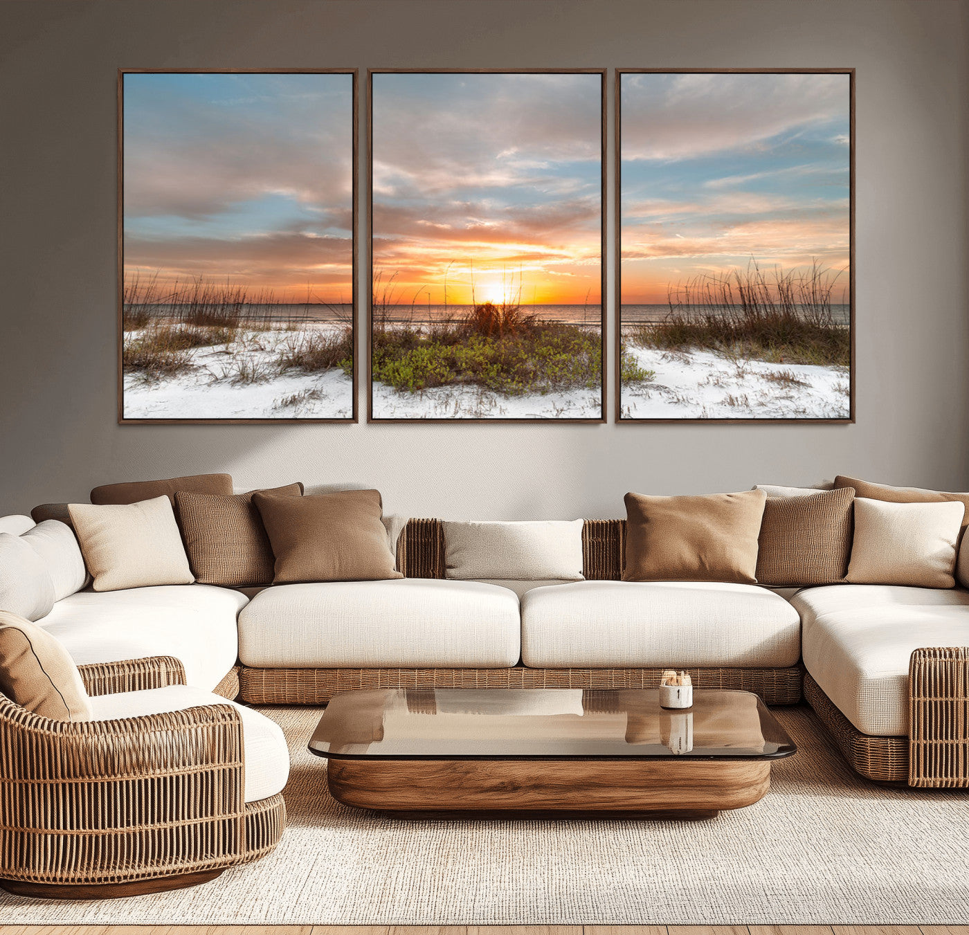 A tranquil beach scene featuring golden sunset hues over the water, with grasses in the foreground and a peaceful, serene atmosphere.