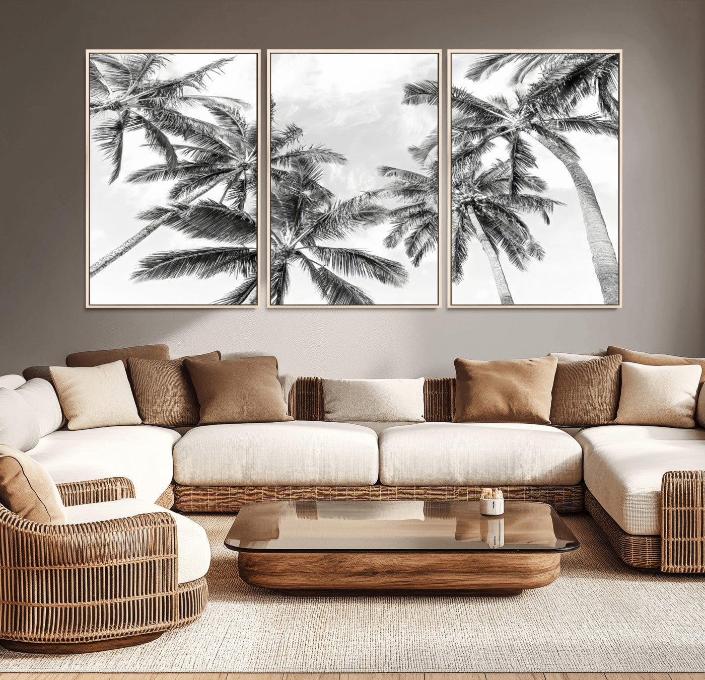 Black and white tropical palm trees viewed from below, swaying gently against a bright sky, creating a serene and elegant coastal atmosphere.