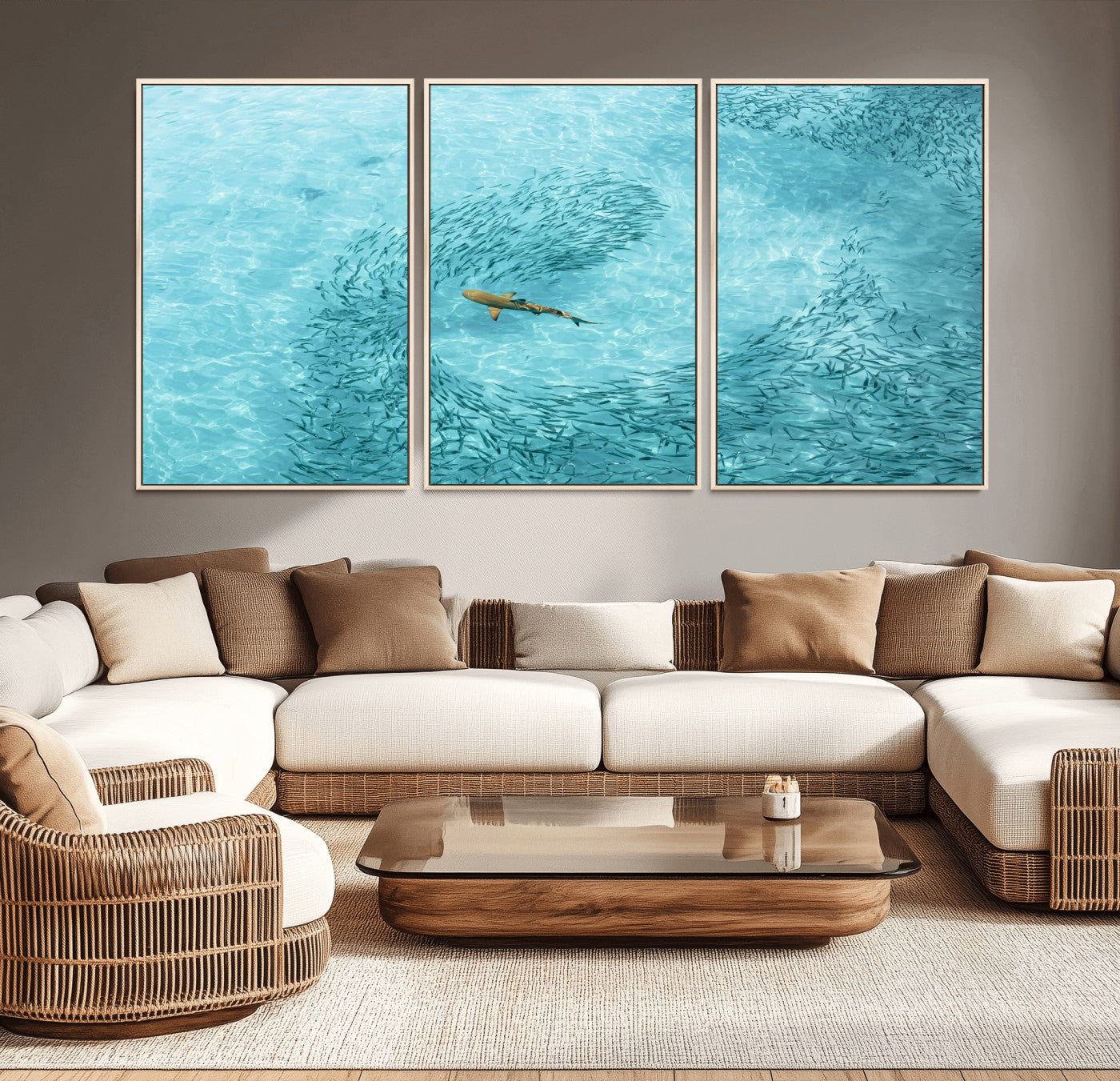 Aerial view of a shark swimming through a swirl of fish in clear turquoise waters, perfect for calm coastal or beach house decor.