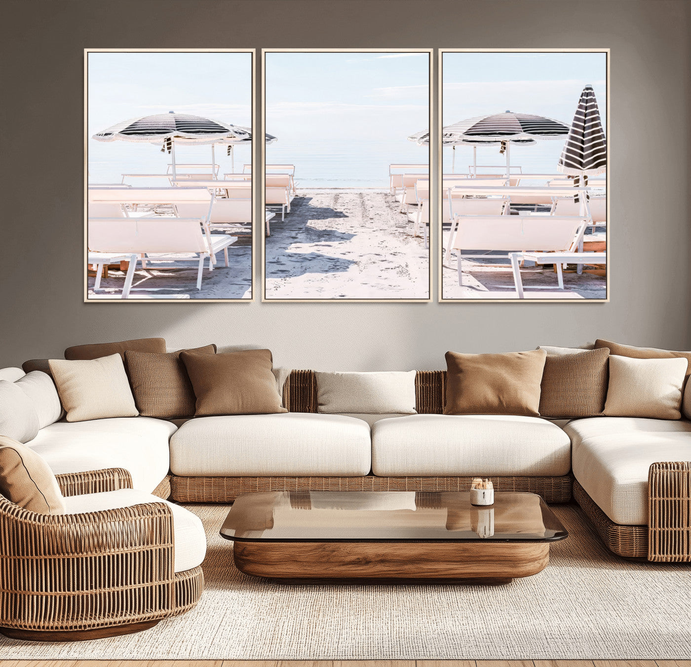 A serene minimalist beach scene featuring striped umbrellas, soft pastel sand, and an elegant lounge setup, creating a tranquil and stylish coastal retreat.