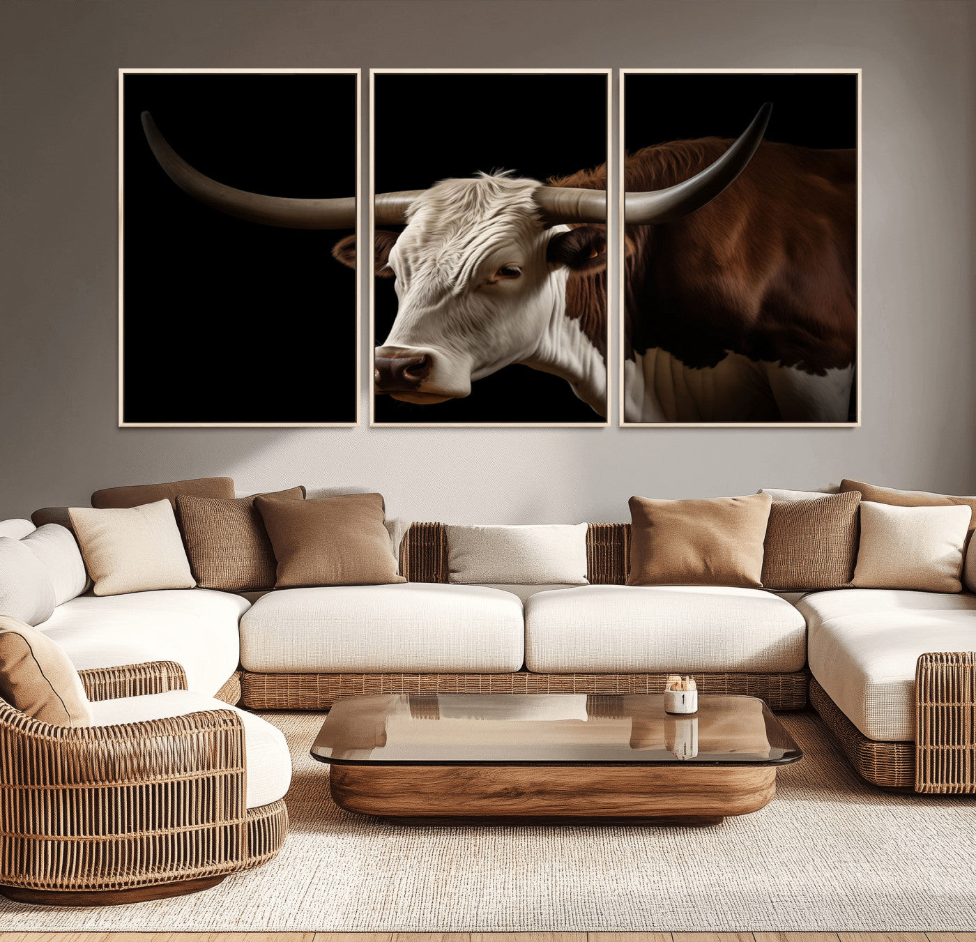 "Close-up of a brown and white longhorn cow with prominent curved horns against a black background."