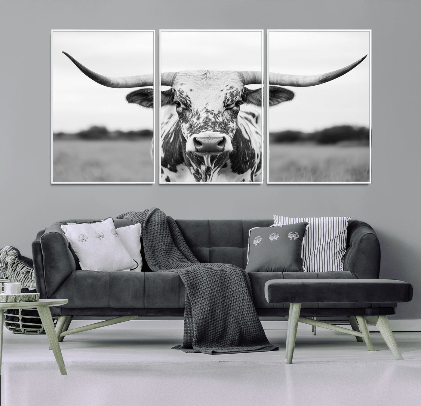 Capture the strength and elegance of nature with this striking black and white portrait of a longhorn cow. Its powerful presence makes a bold statement in any room.