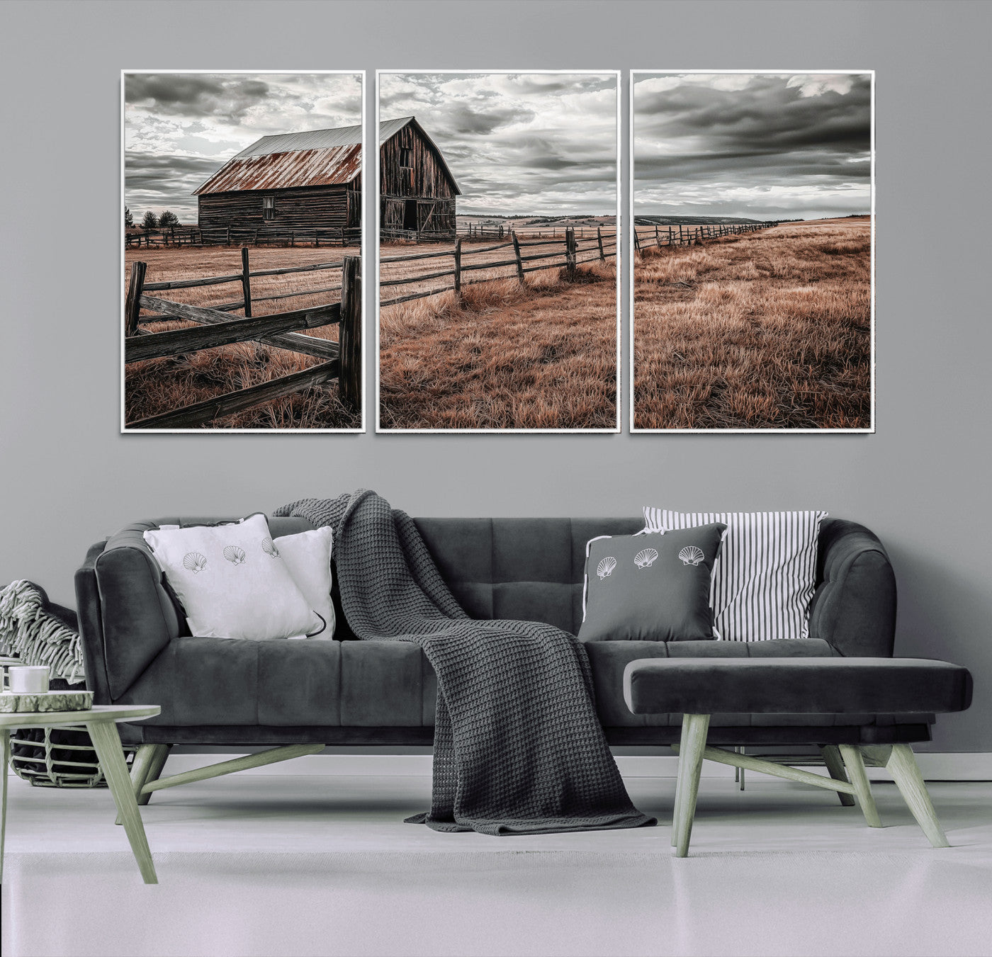 Framed canvas of a rustic barn under a moody sky with weathered fence and dark fields, ideal for farmhouse or rural-style wall decor.