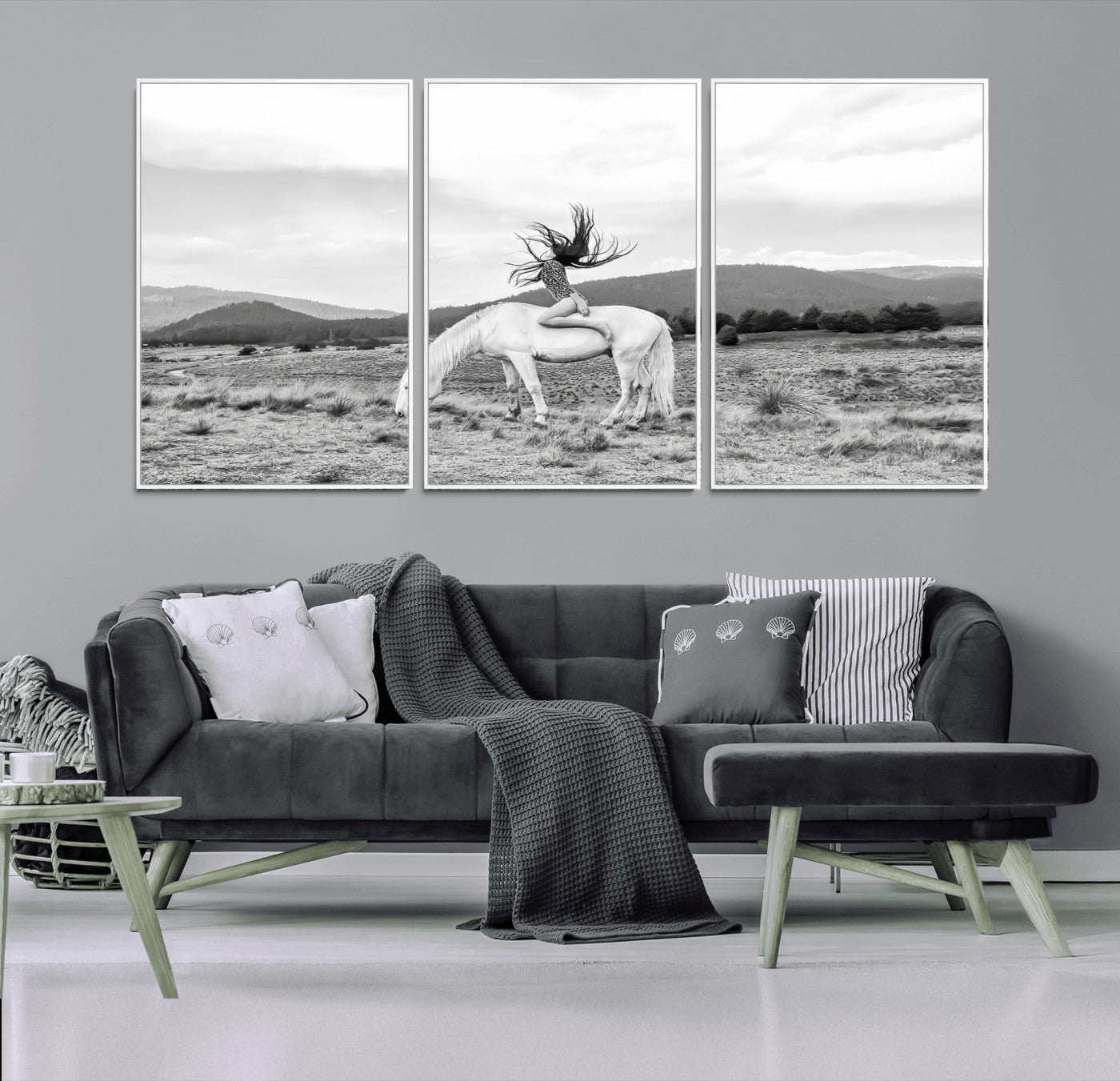Black and white photo of a woman on a white horse in moody tones, ideal for Western Boho or modern rustic-style home decor.