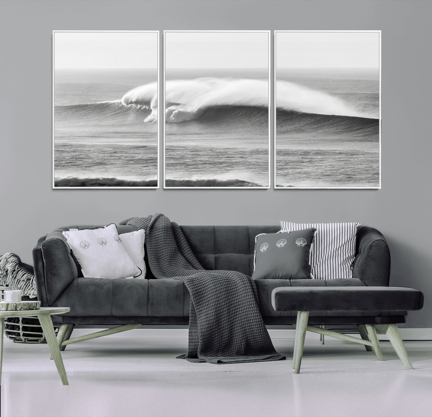 A dramatic black and white ocean wave crashing with immense force, capturing the raw power and movement of the sea in a bold seascape.