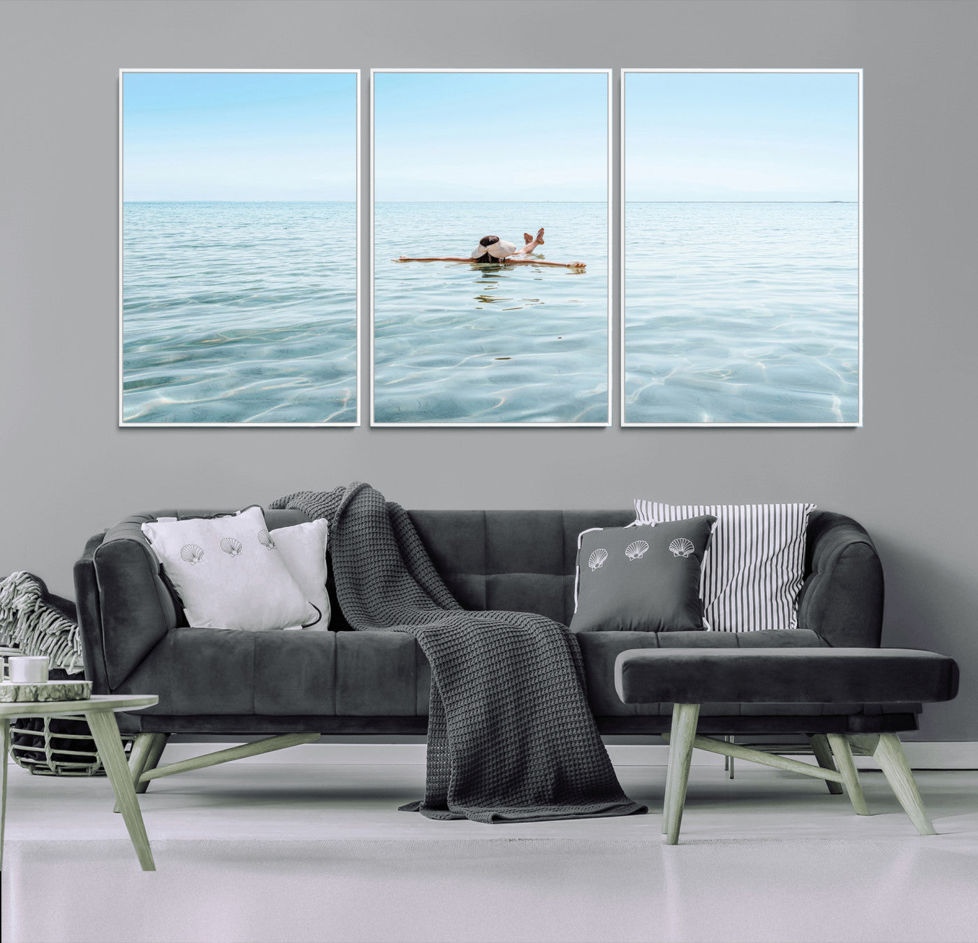 A peaceful minimalist scene of a person floating on crystal-clear water, surrounded by a vast open horizon, capturing relaxation and serenity in a tranquil aquatic setting.