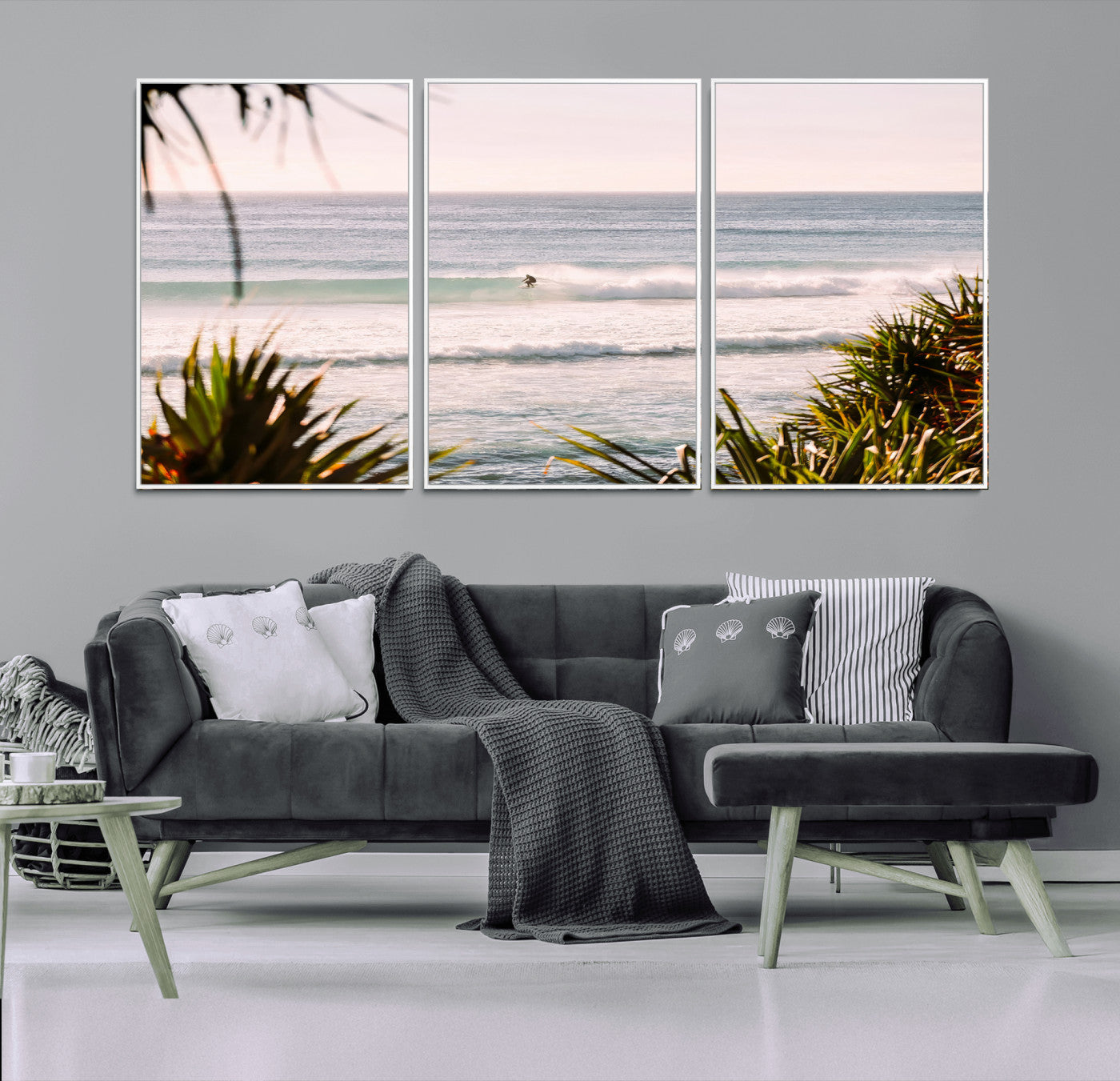 Canvas of a lone surfer riding a pastel wave at sunrise, perfect for tropical or coastal-themed spaces with a relaxed, airy vibe.
