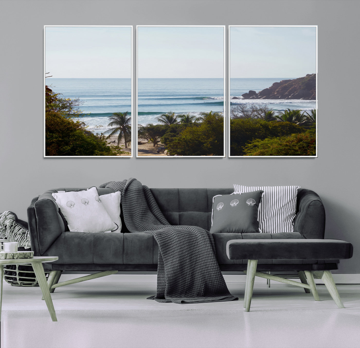 View of calm ocean waves with palm trees and a tropical coastline, ideal for coastal boho or beach-themed wall decor.