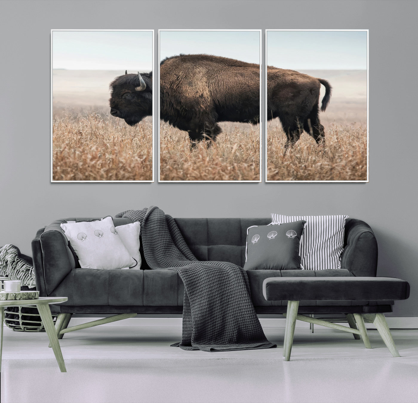 A lone bison stands in a vast prairie under a soft sky, evoking freedom and rustic charm for western or farmhouse inspired interiors.
