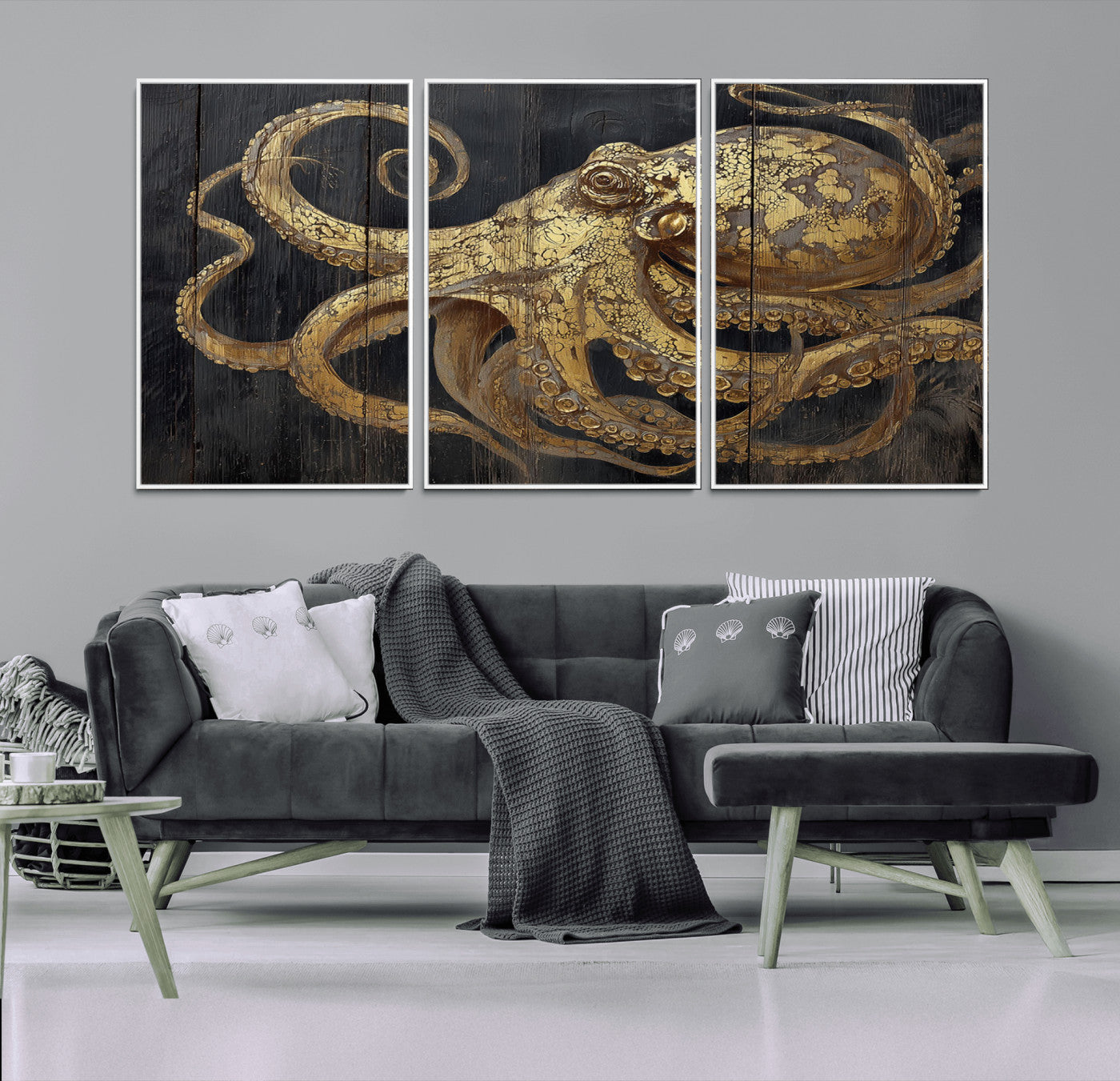 A detailed gold illustration of an octopus on black wooden planks, showing its intricate tentacles and textured skin in an artistic style.