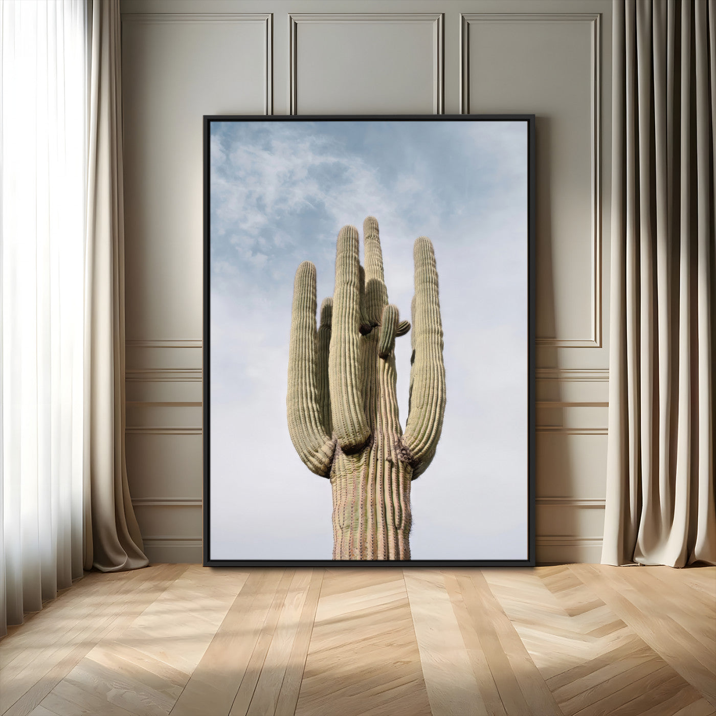 Vertical photo of a tall saguaro cactus against a soft sky, ideal for earthy or Southwestern home decor with warm neutral tones.