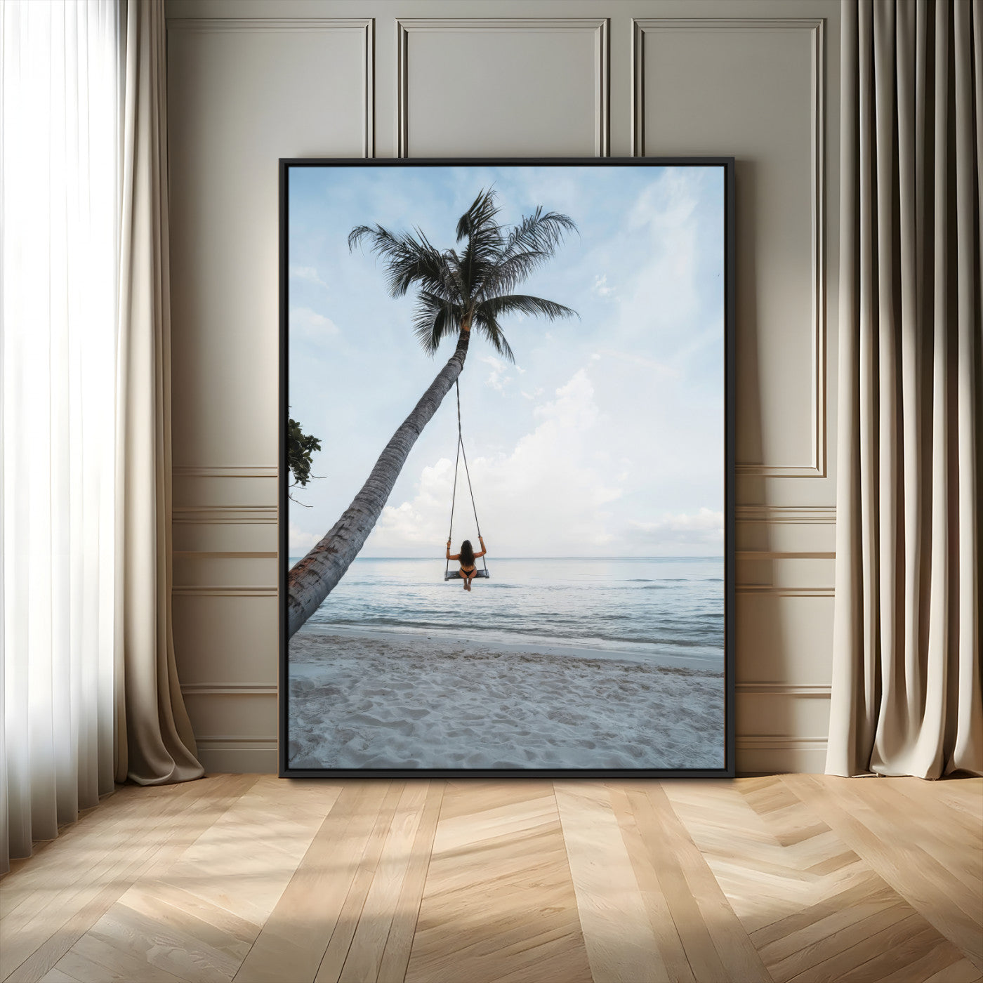 Wall art of a girl on a swing hanging from a palm tree over calm ocean waters, perfect for tropical or minimalist coastal decor.