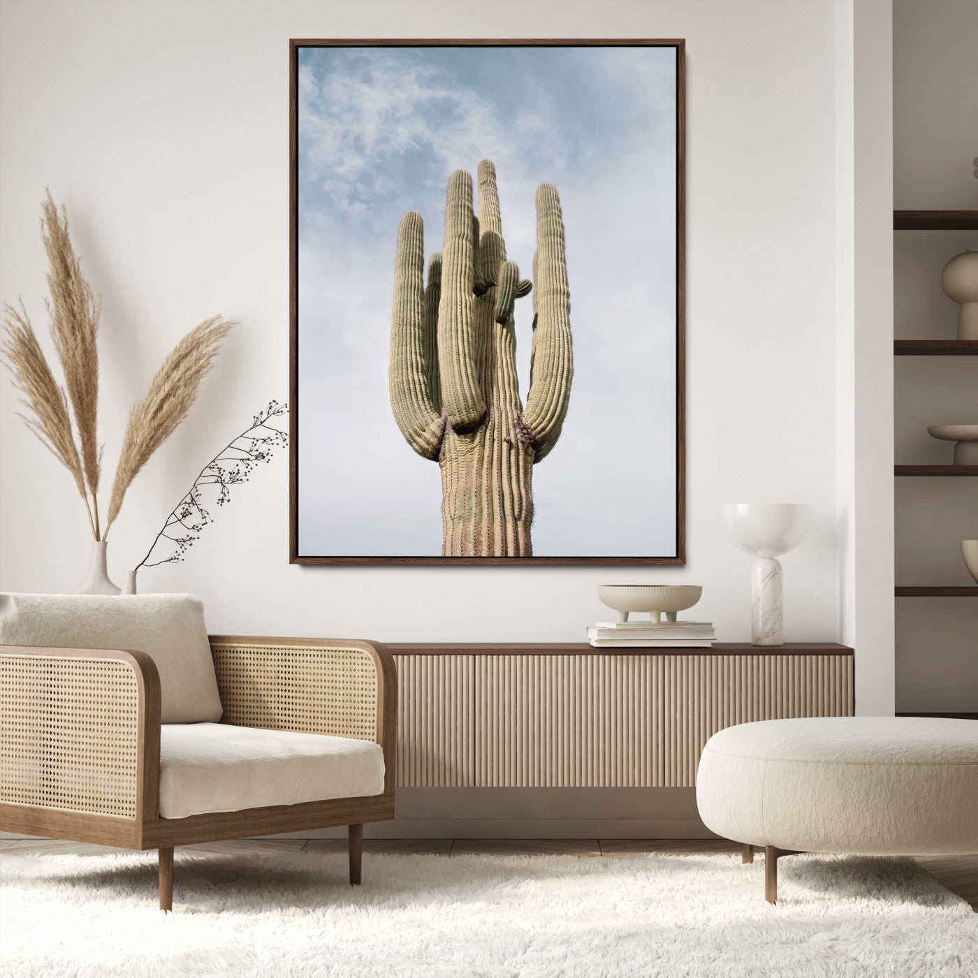 Vertical photo of a tall saguaro cactus against a soft sky, ideal for earthy or Southwestern home decor with warm neutral tones.
