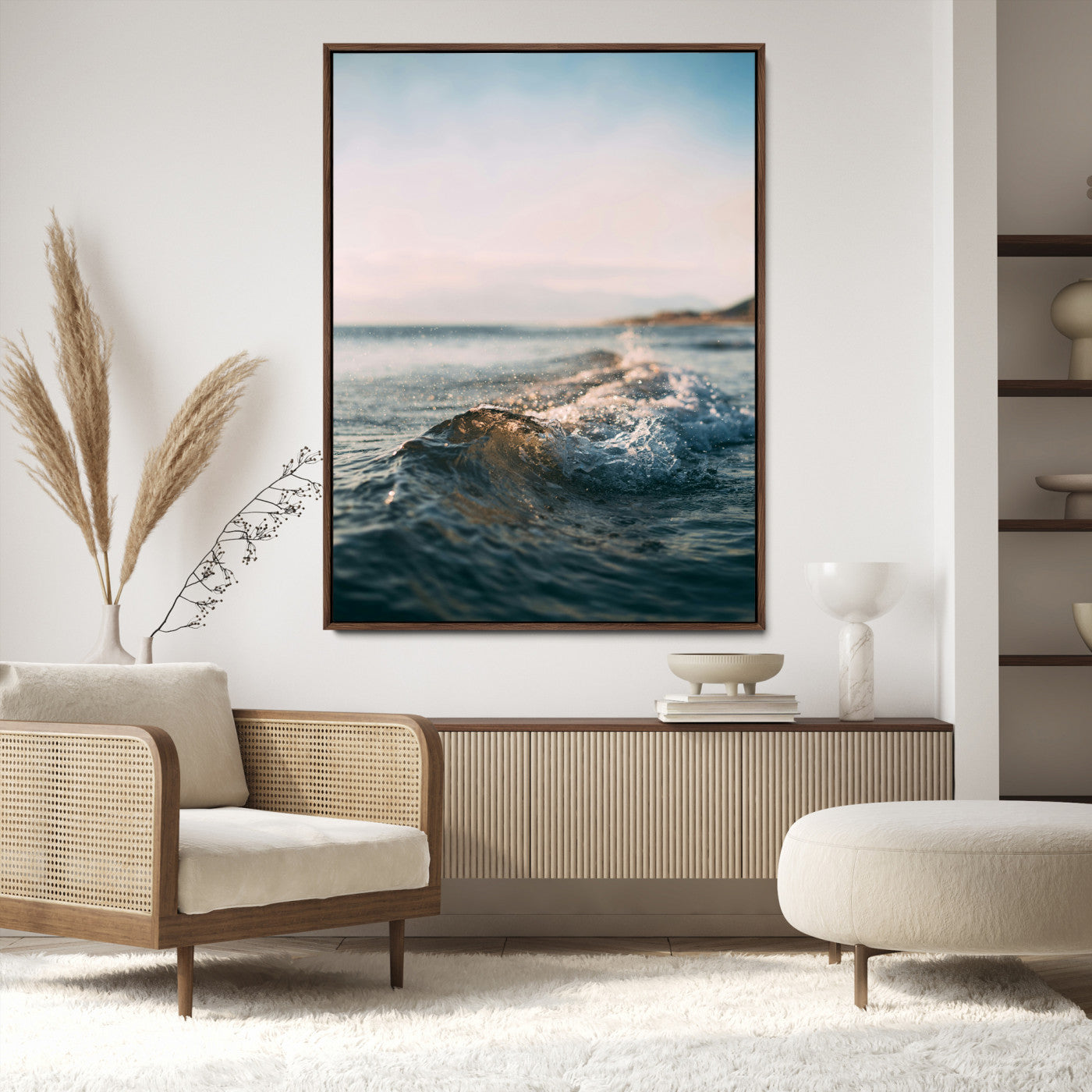 Close-up of ocean waves rolling gently toward the shore at sunset, creating a peaceful and minimalist coastal scene.