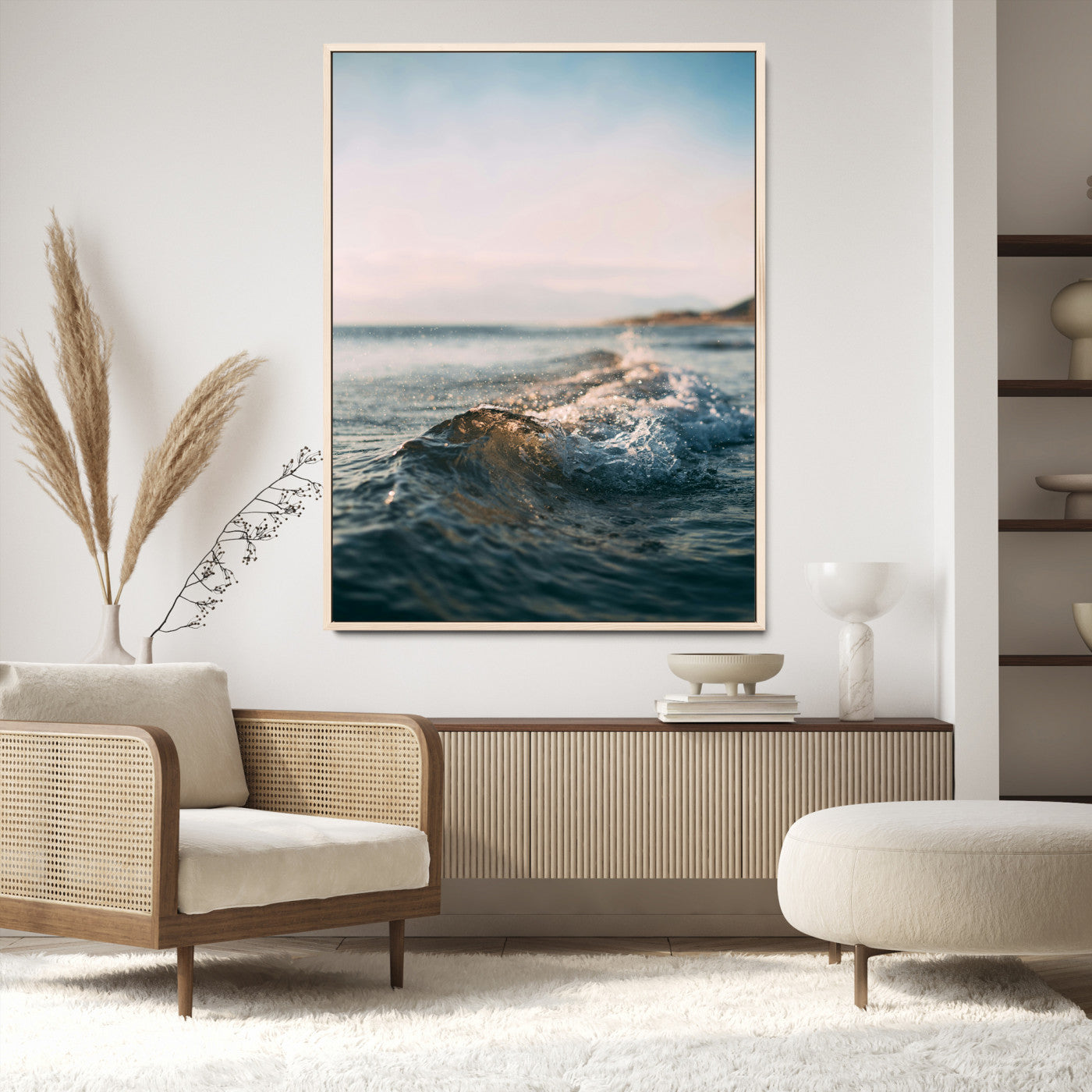 Close-up of ocean waves rolling gently toward the shore at sunset, creating a peaceful and minimalist coastal scene.