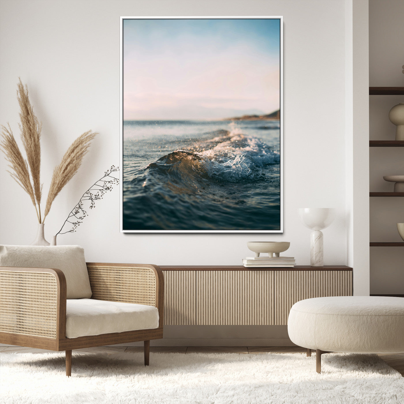Close-up of ocean waves rolling gently toward the shore at sunset, creating a peaceful and minimalist coastal scene.