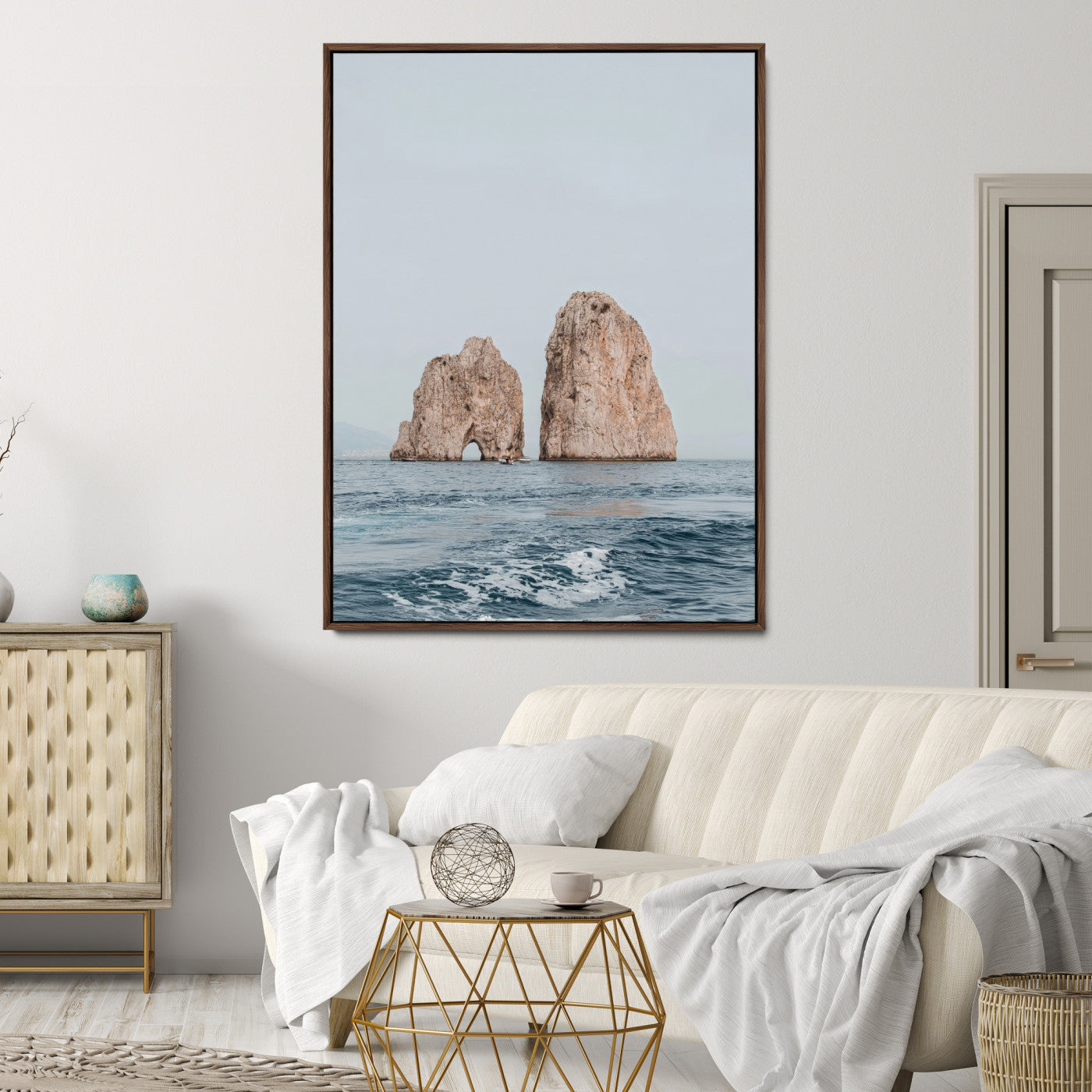 Serene photograph of the Faraglioni rocks in Capri with calm blue waters, perfect for Mediterranean coastal or minimalist travel-themed decor.
