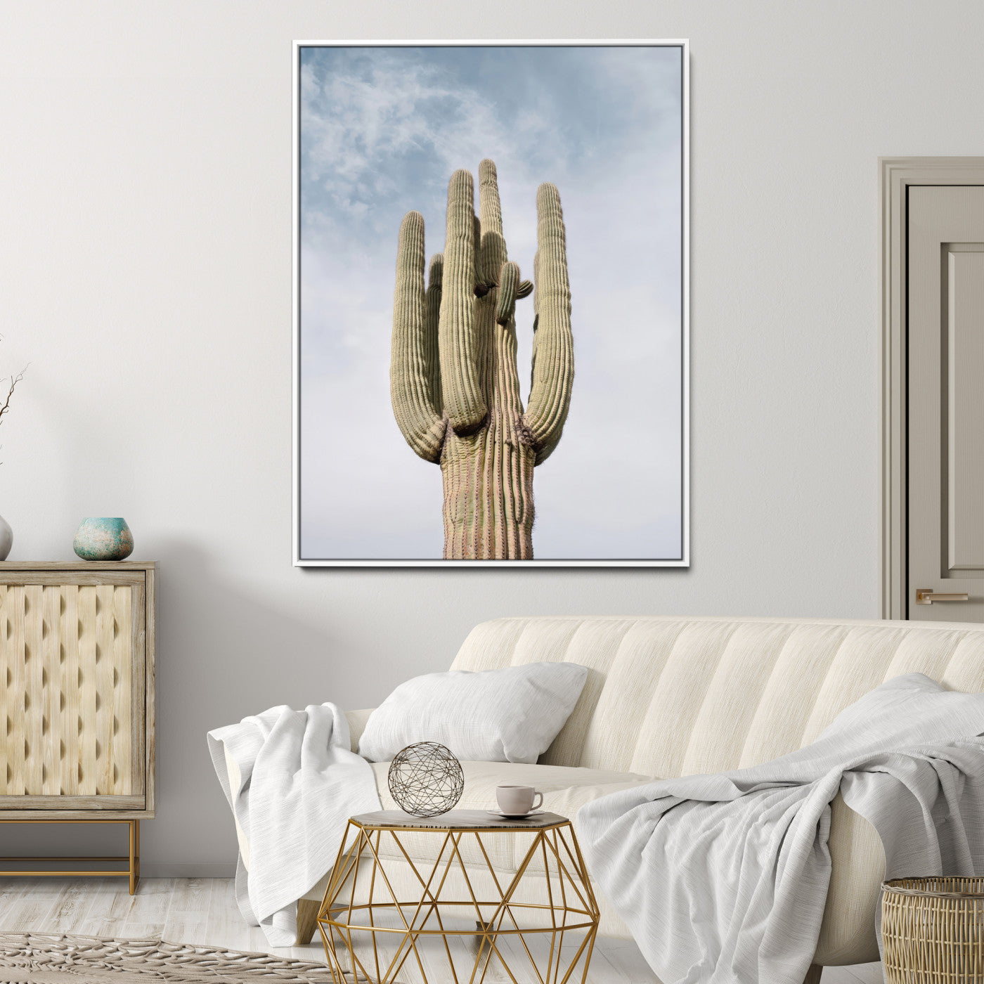 Vertical photo of a tall saguaro cactus against a soft sky, ideal for earthy or Southwestern home decor with warm neutral tones.