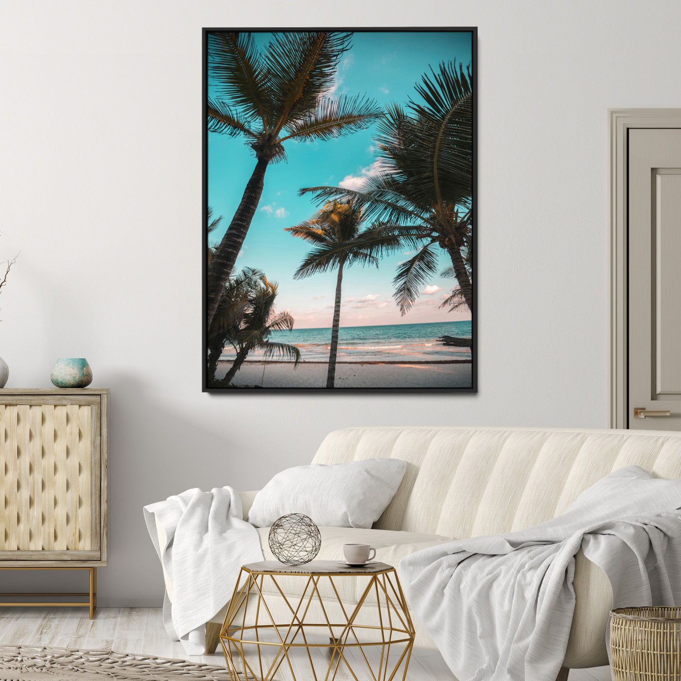 Tall palm trees swaying over a tropical beach with turquoise ocean waves and a soft sunset glow, creating a relaxing coastal vibe.