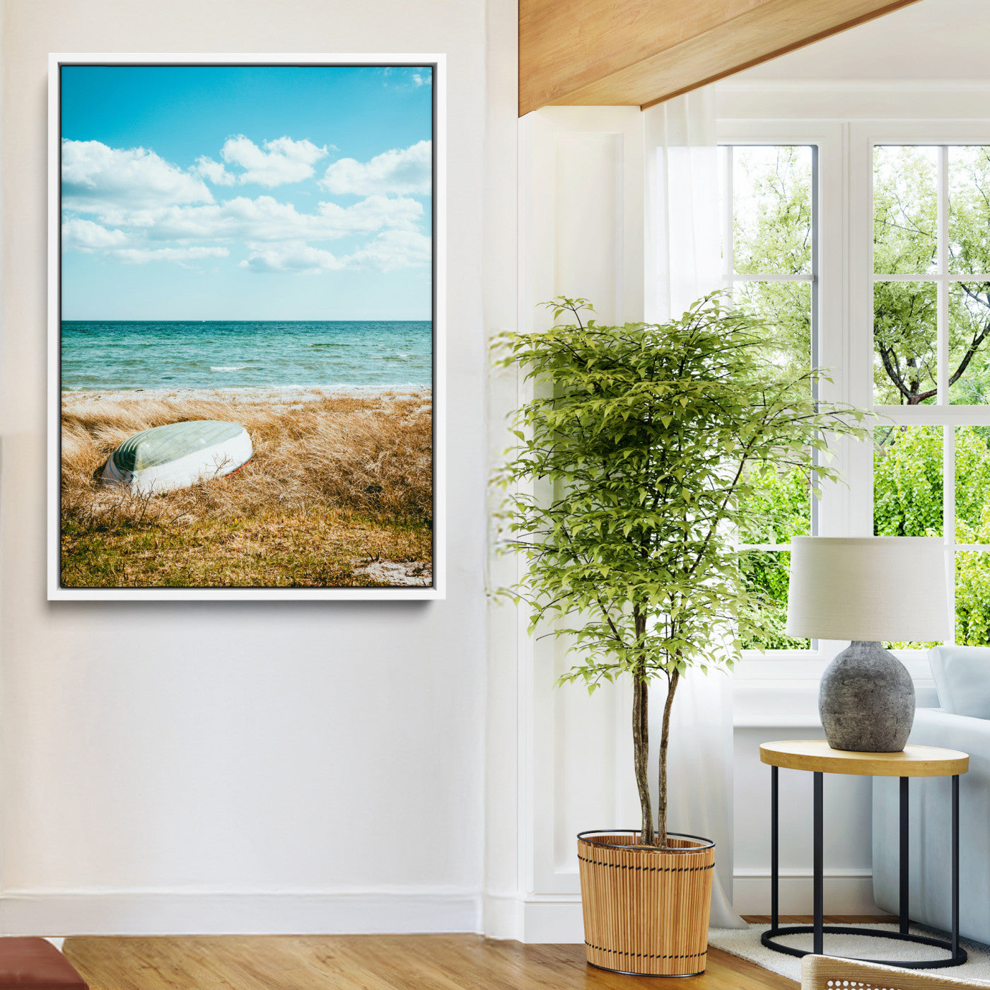 A small boat resting on a grassy shore with ocean waves and a bright blue sky, creating a peaceful coastal atmosphere.