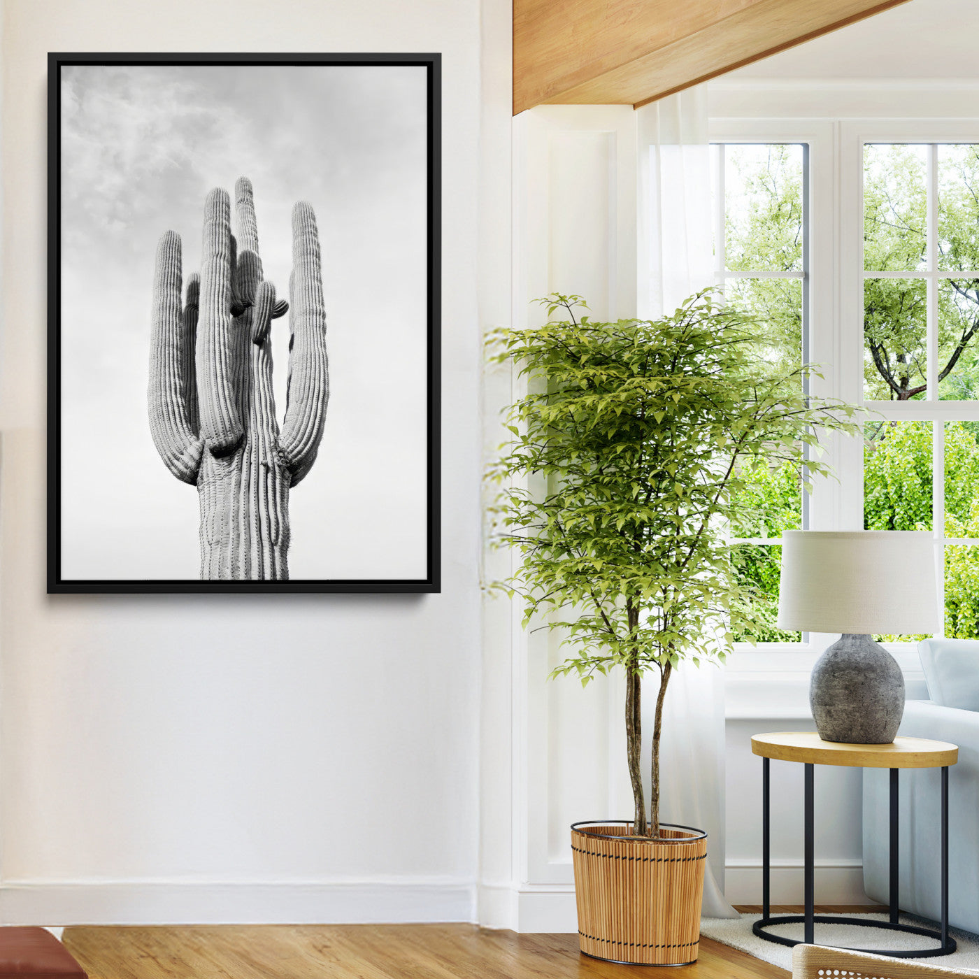 Canvas of a tall saguaro cactus in black and white with moody tones, perfect for southwestern minimalist or modern desert-themed home decor.