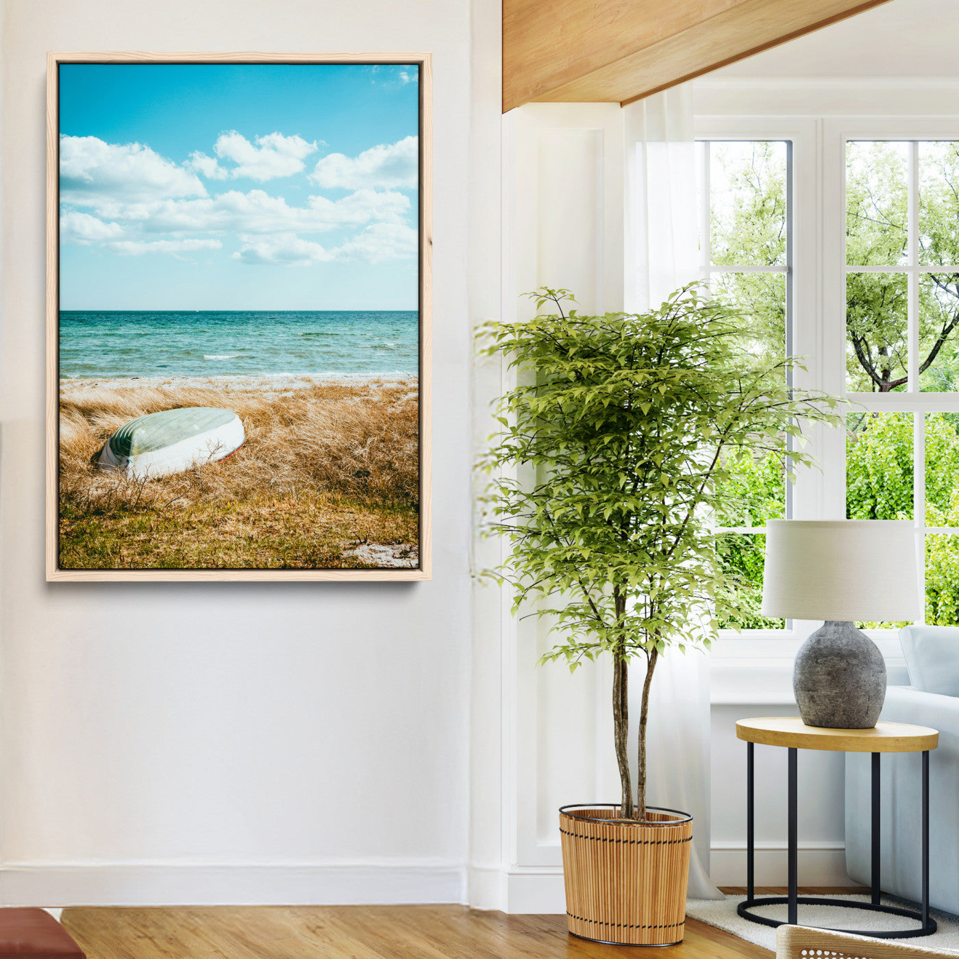 A small boat resting on a grassy shore with ocean waves and a bright blue sky, creating a peaceful coastal atmosphere.