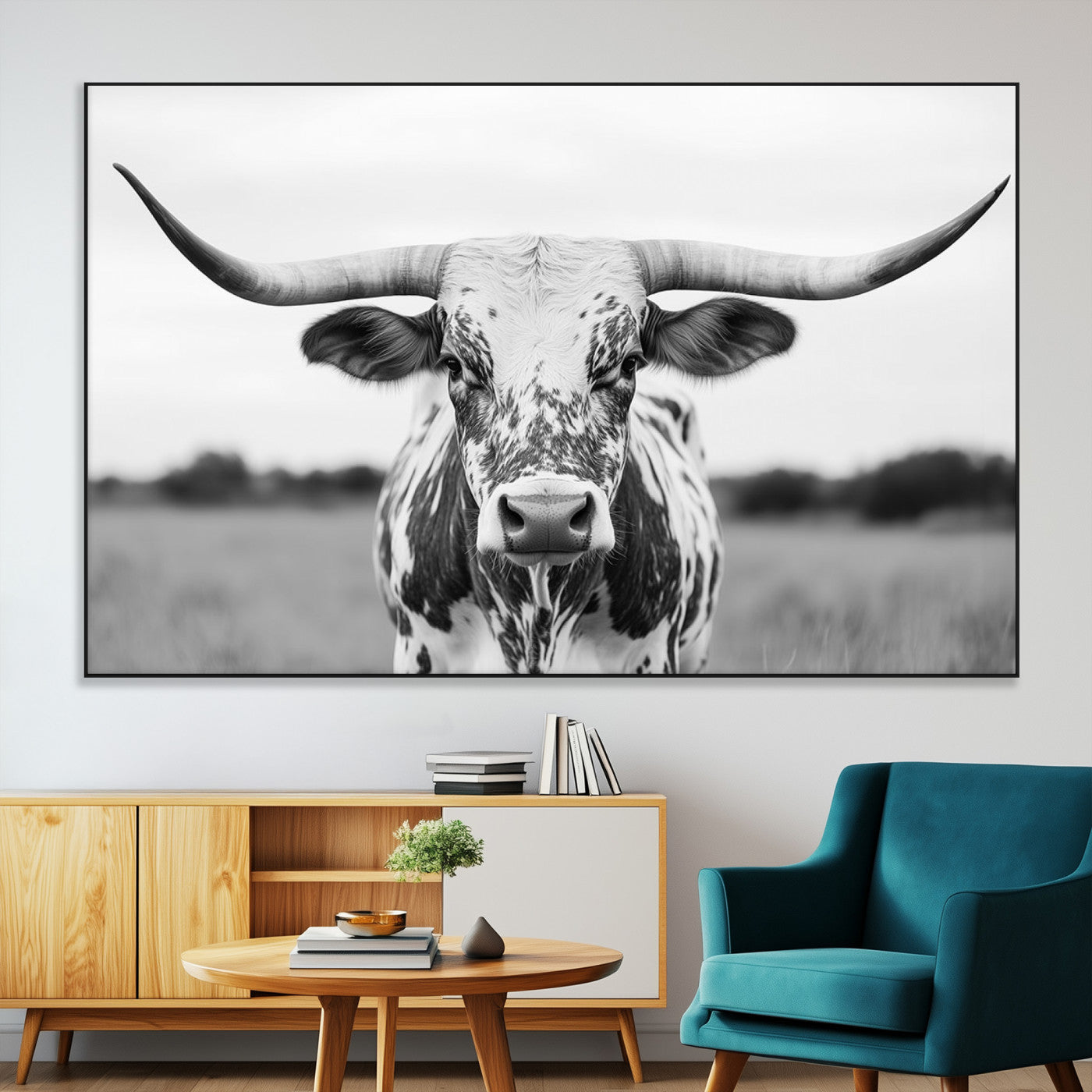 Capture the strength and elegance of nature with this striking black and white portrait of a longhorn cow. Its powerful presence makes a bold statement in any room.