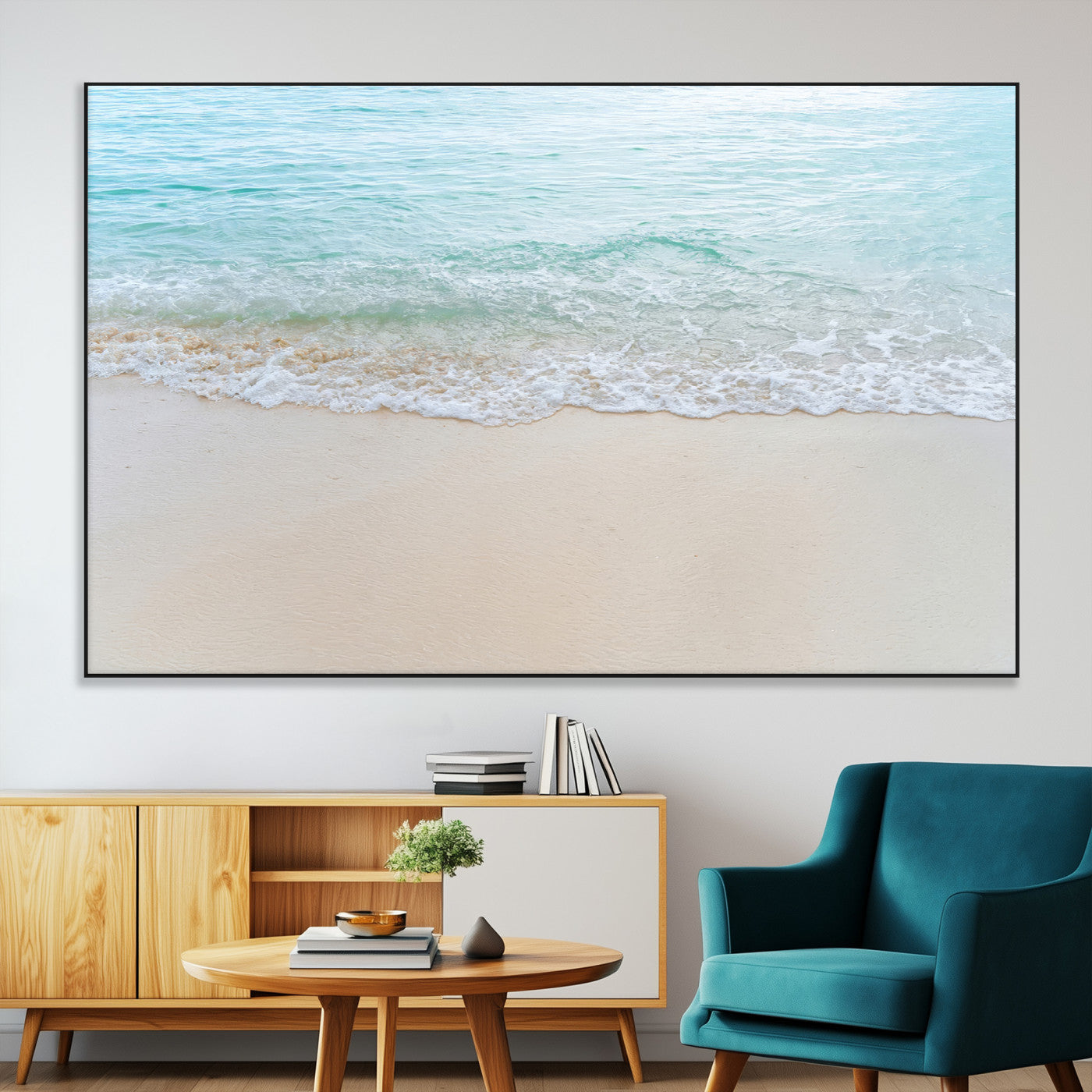 Soft shoreline with gentle aqua waves on smooth sand, ideal for minimalist coastal or pastel ocean-inspired home wall decor.