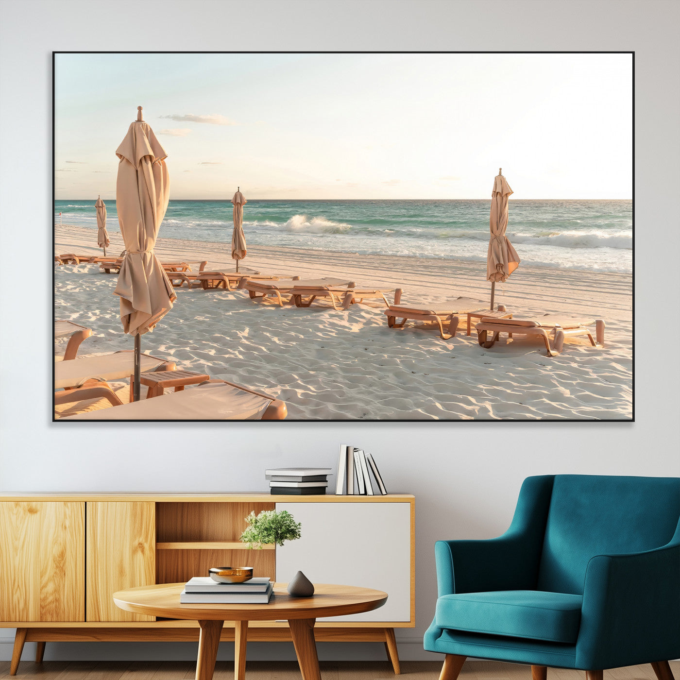 Minimalist photo of empty beach loungers and umbrellas on soft sand, ideal for calm seaside or pastel coastal-style home decor.