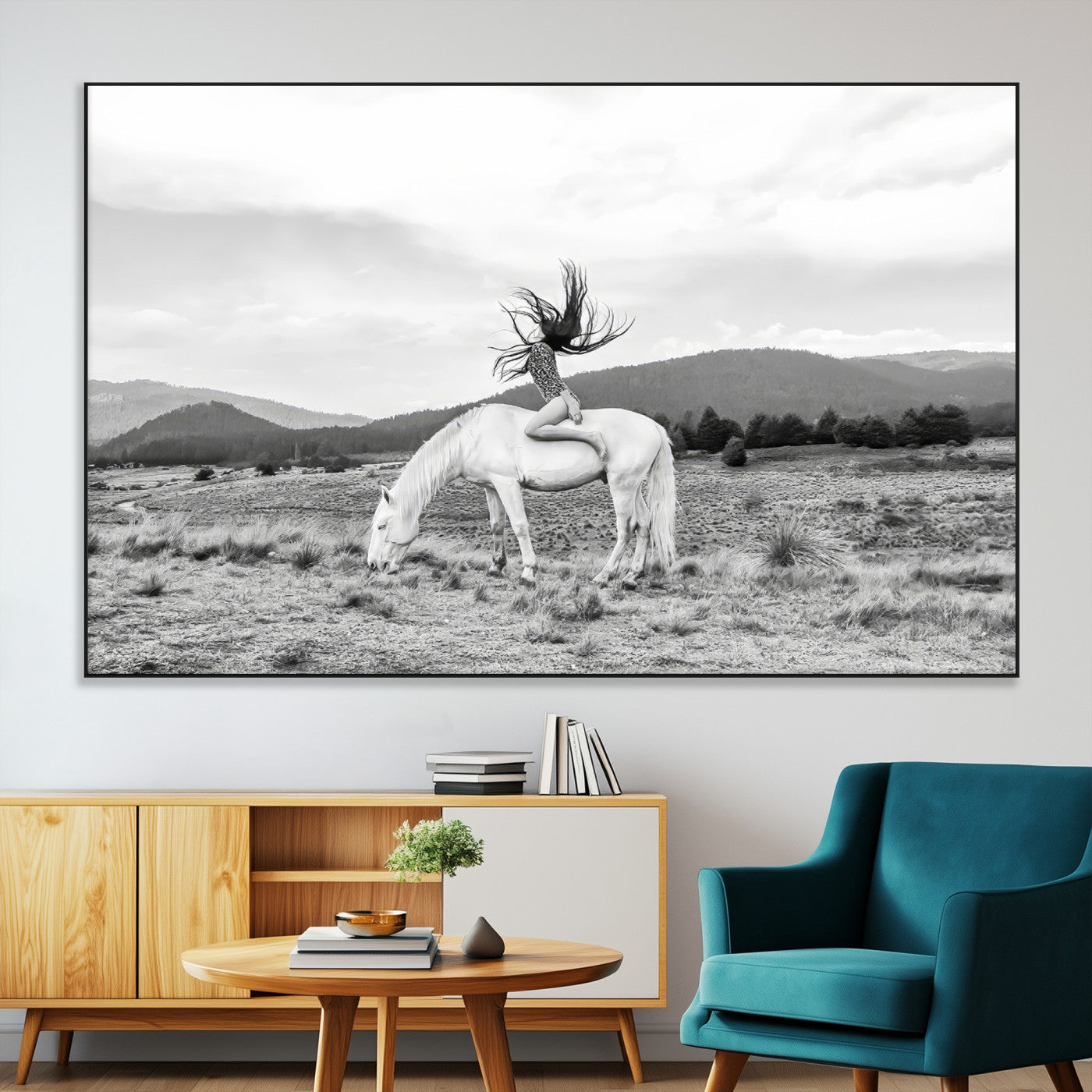 Black and white photo of a woman on a white horse in moody tones, ideal for Western Boho or modern rustic-style home decor.