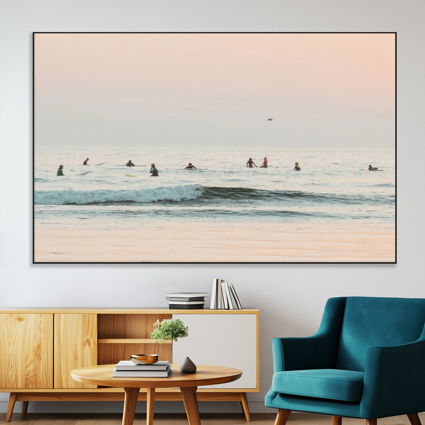 Dreamy photo of surfers waiting on soft pastel waves under a pink sunset sky, ideal for soft coastal minimalist or serene ocean-themed home decor.