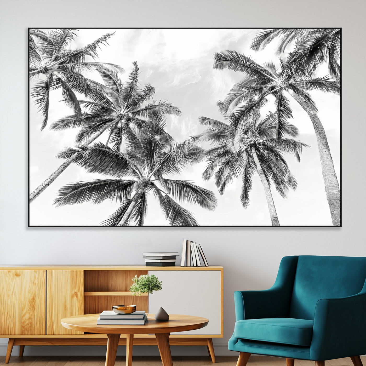 Black and white tropical palm trees viewed from below, swaying gently against a bright sky, creating a serene and elegant coastal atmosphere.