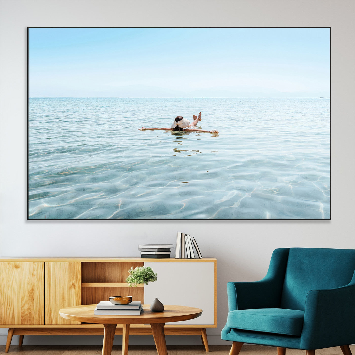A peaceful minimalist scene of a person floating on crystal-clear water, surrounded by a vast open horizon, capturing relaxation and serenity in a tranquil aquatic setting.