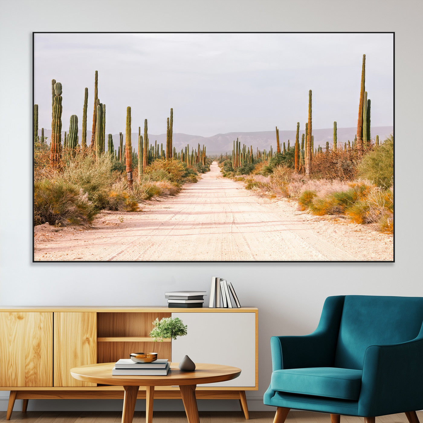 A desert road lined with saguaro cacti under a golden sky, creating a warm southwestern feel, perfect for boho or rustic decor.