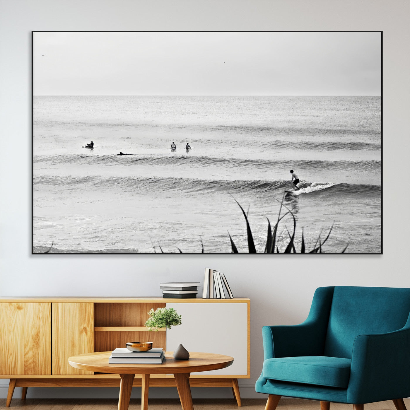 Monochrome canvas of surfers on calm ocean waves, ideal for minimalist coastal or beach-inspired interior decor.