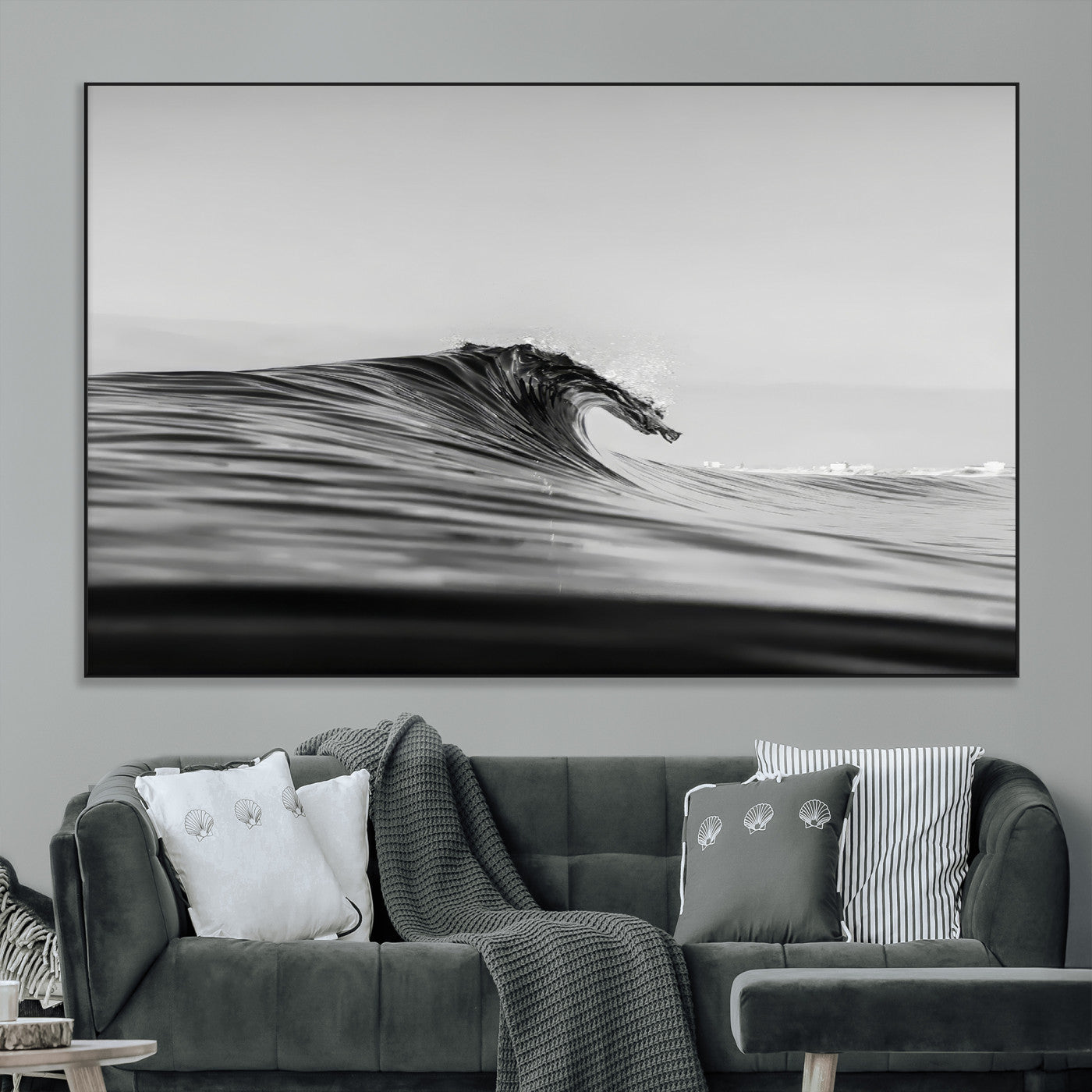 Striking black and white photo of a curling wave, ideal for modern coastal or minimalist wall decor settings.