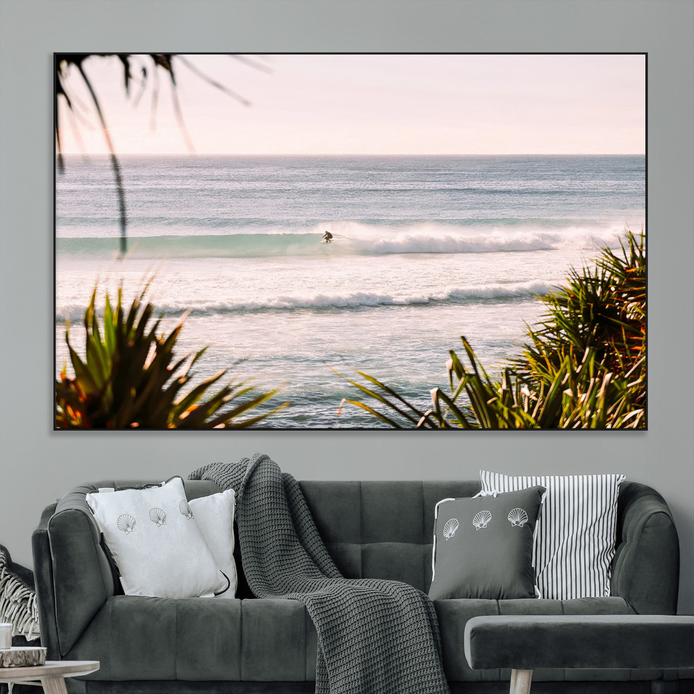 Canvas of a lone surfer riding a pastel wave at sunrise, perfect for tropical or coastal-themed spaces with a relaxed, airy vibe.