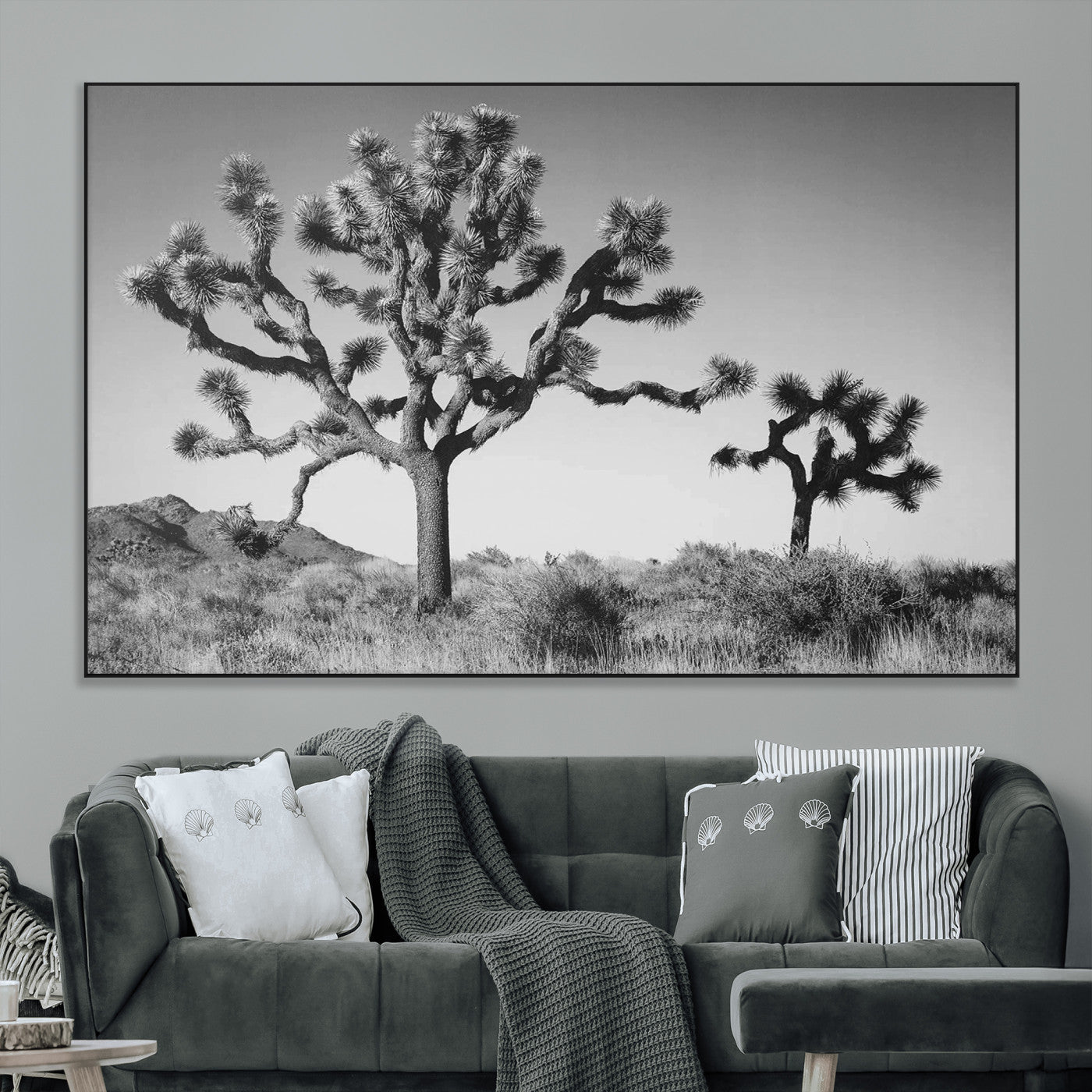 Black and white Joshua trees in a rugged desert landscape, creating a calm and minimalist feel for natural or rustic-themed interiors.