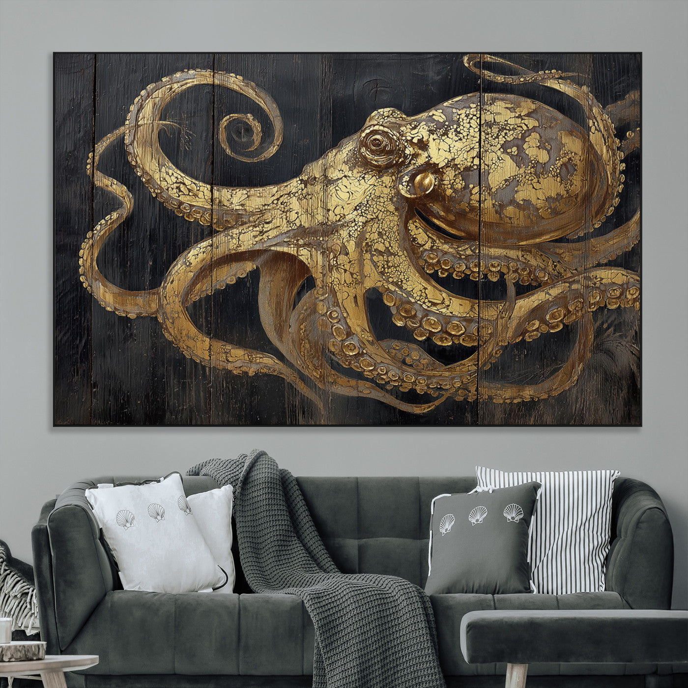 A detailed gold illustration of an octopus on black wooden planks, showing its intricate tentacles and textured skin in an artistic style.