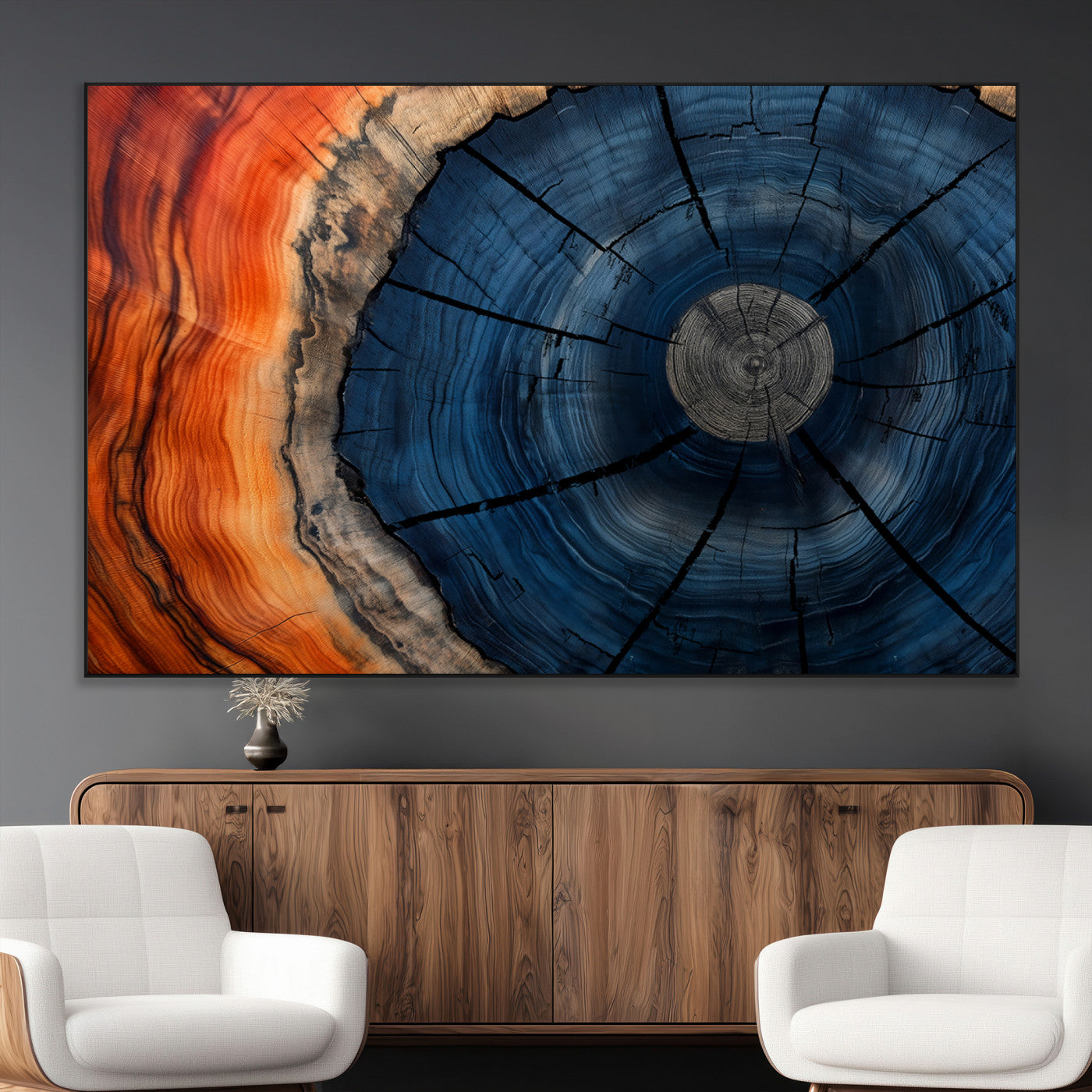 A captivating close-up of a tree trunk, showcasing its concentric rings in rich shades of blue, orange, and brown, highlighting the organic patterns of natural wood.